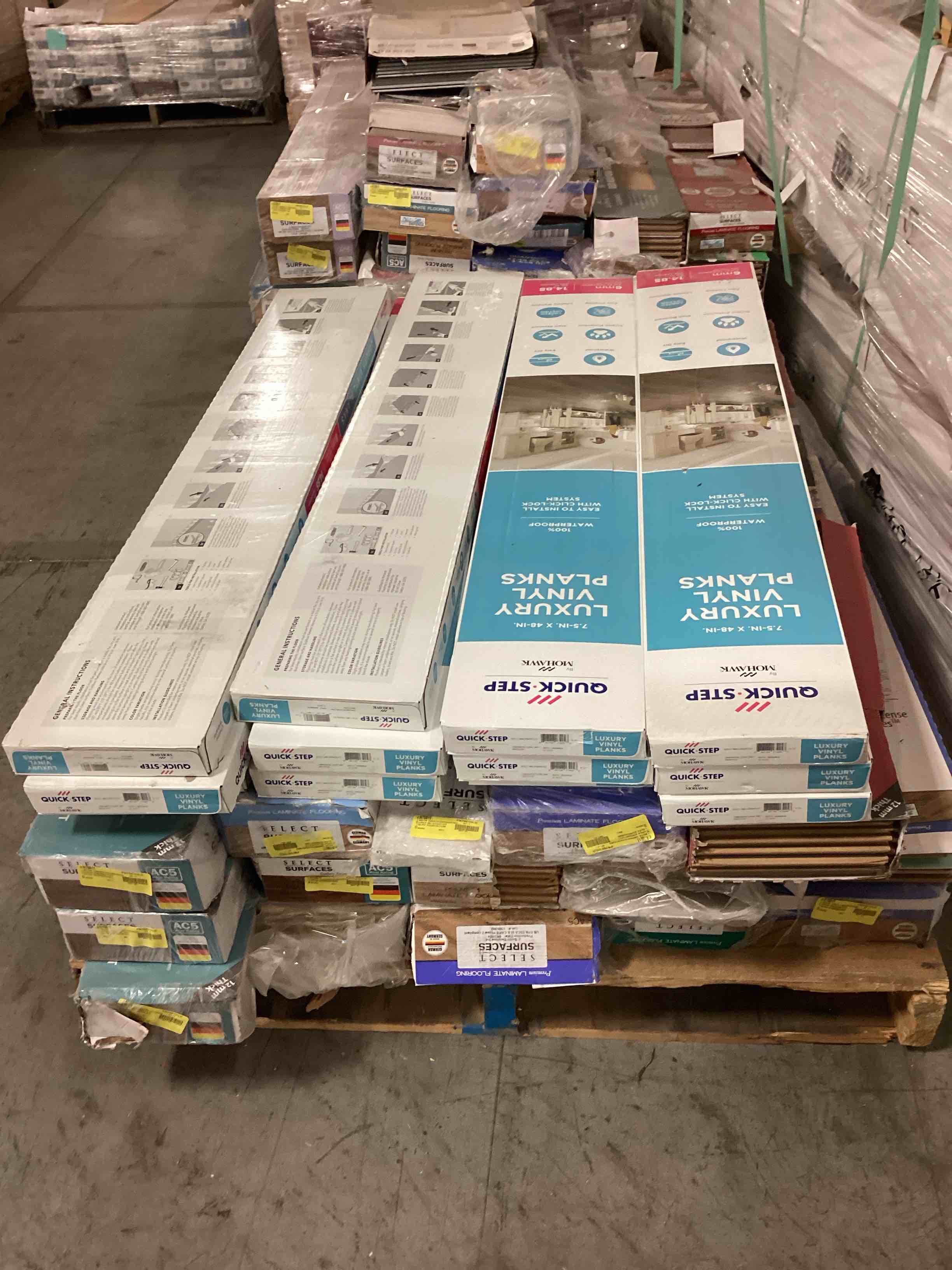 Assorted Laminated Flooring Assorted Colors and brand  27 Boxes for pick up, 