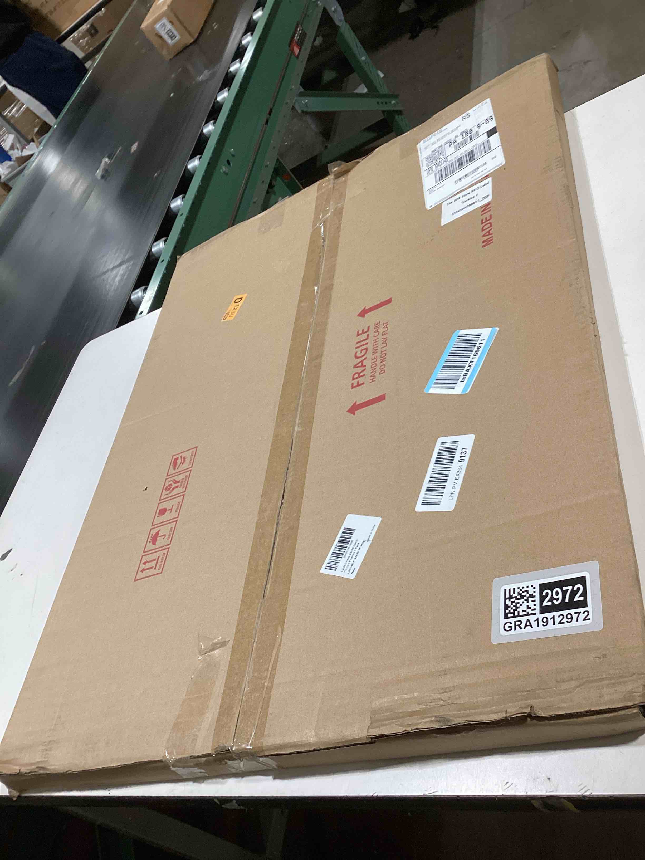 Condition photo showing As Is for LaVie Home 22 x 30 Poster Frame Black, Display Pictures 18x27 with Mat or 22x30 Without Mat, Stable and Sturdy Picture Frame and Polished Plexiglass, Horizontal and Vertical Format of The Wall?1 Pack?
