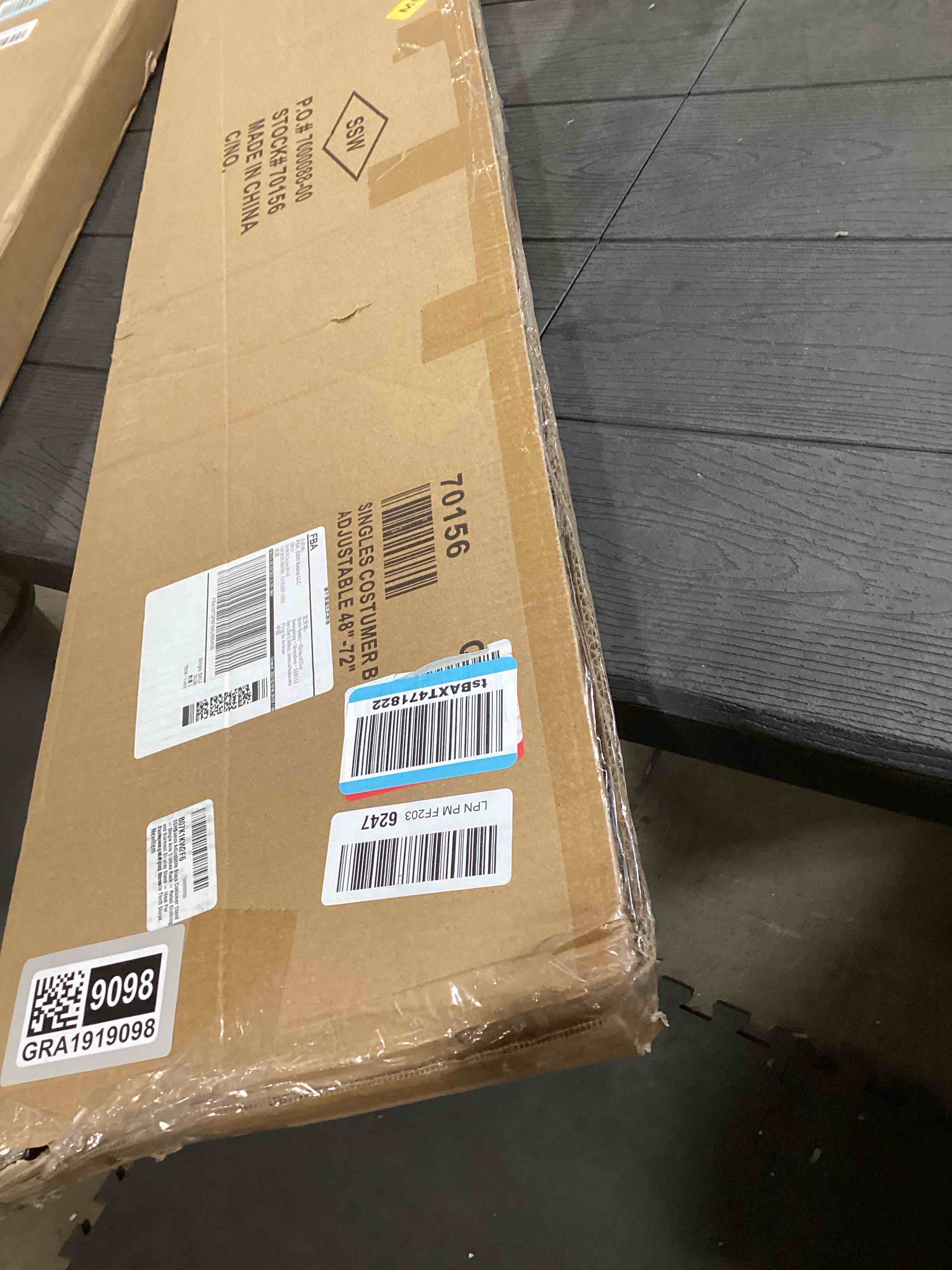 Condition photo showing Good Condition for SSWBasics Adjustable Black Costumer Stand – Single Arm Clothes Rack - Retail Clothing and Garment Display Stand – Ideal For Showcasing Hanging Items In Thrift Shops, Boutiques and Retail Stores