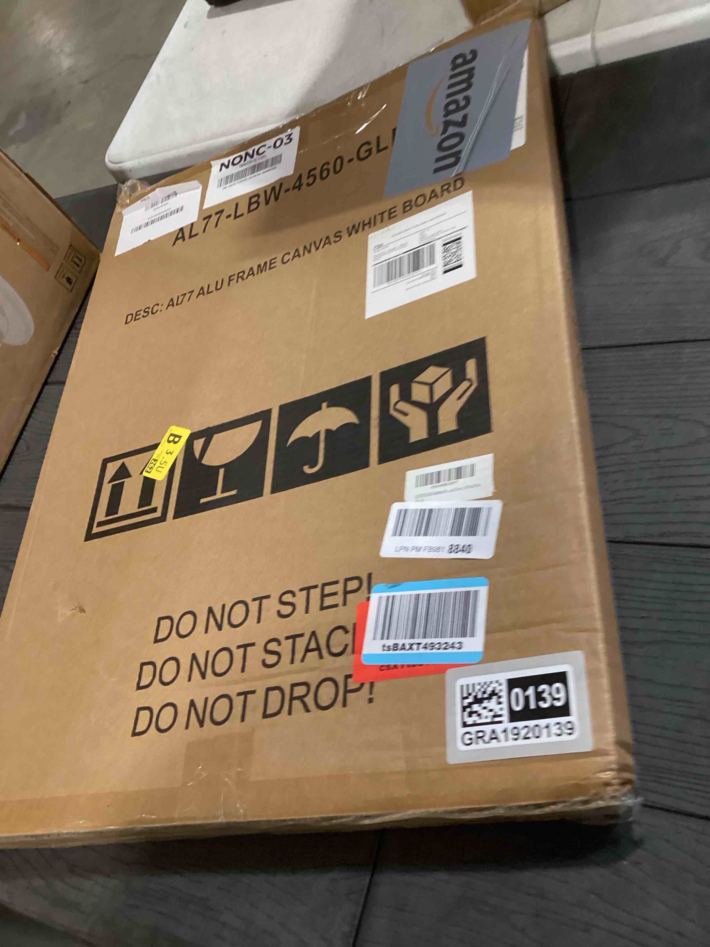 Condition photo showing As Is for Linen Bulletin Board 24 x18 Inches, White Cork Board for Wall, Gold Aluminum Framed Fabric Pin Board Tack Board, 10 Push Pins, White Linen White Linen 24"x18"