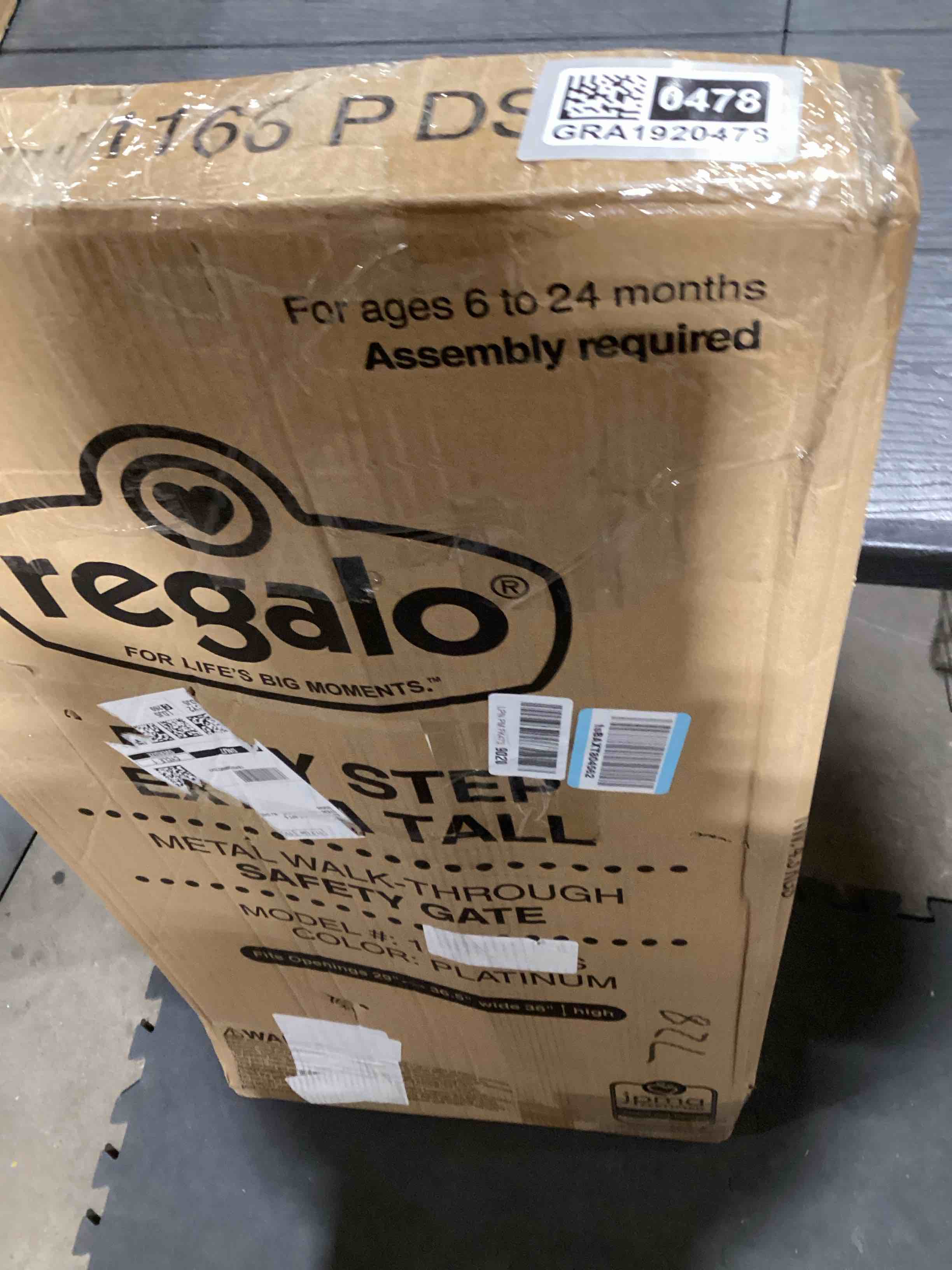 Condition photo showing As Is for Regalo Easy Step Extra Tall Walk Thru Baby Gate, Bonus Kit, Includes 4-Inch Extension Kit, 1 Pack of Pressure Mount Kit and Wall Mount Kit, Platinum