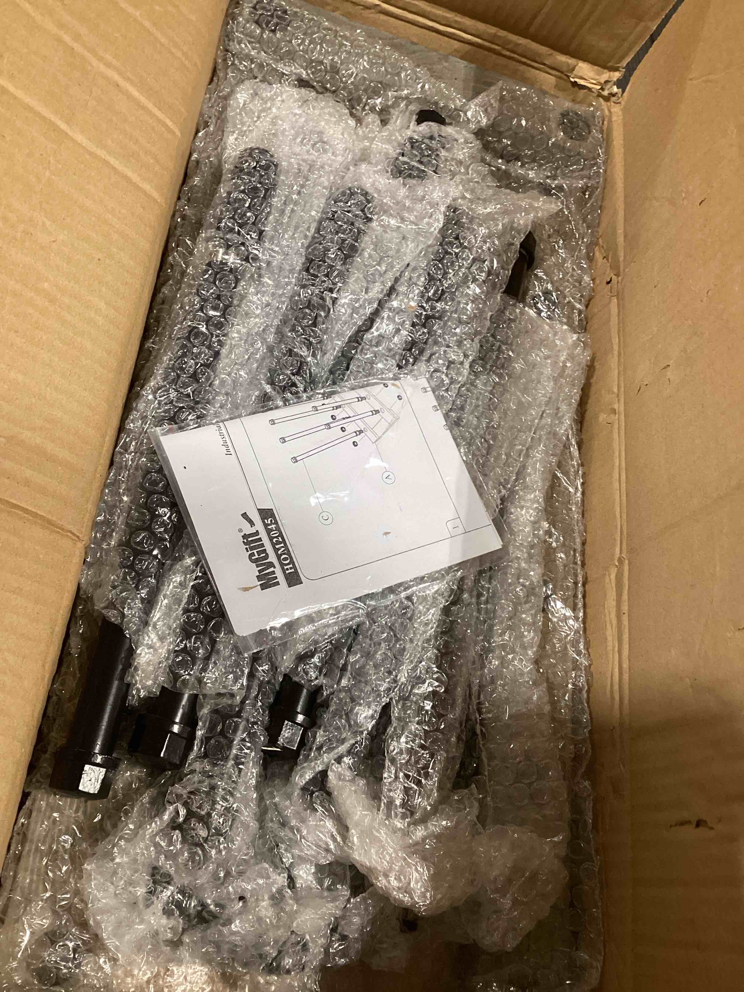 Condition photo showing As Is for MyGift 65-Inch Industrial Black Metal Pipe 12-Hook Coat Stand