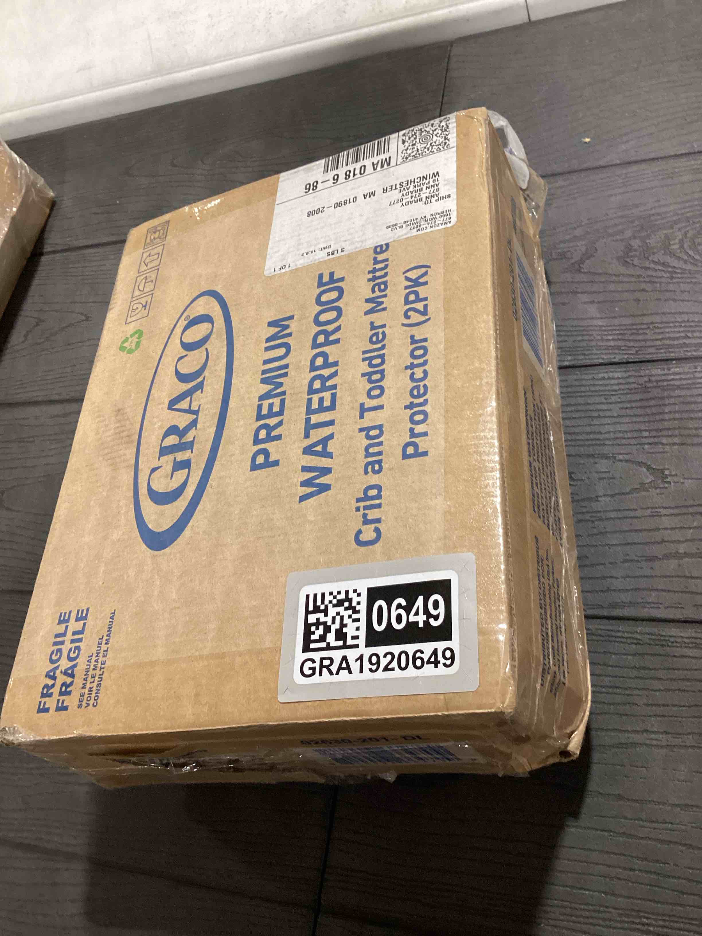 Condition photo showing Good Condition for Graco Premium Waterproof Crib and Toddler Mattress Protector (2 Pack) – GREENGUARD Gold Certified, Machine-Washable & Dryer-Friendly, Waterproof Sleep Surface, Fits Crib & Mattress White 2 Pack