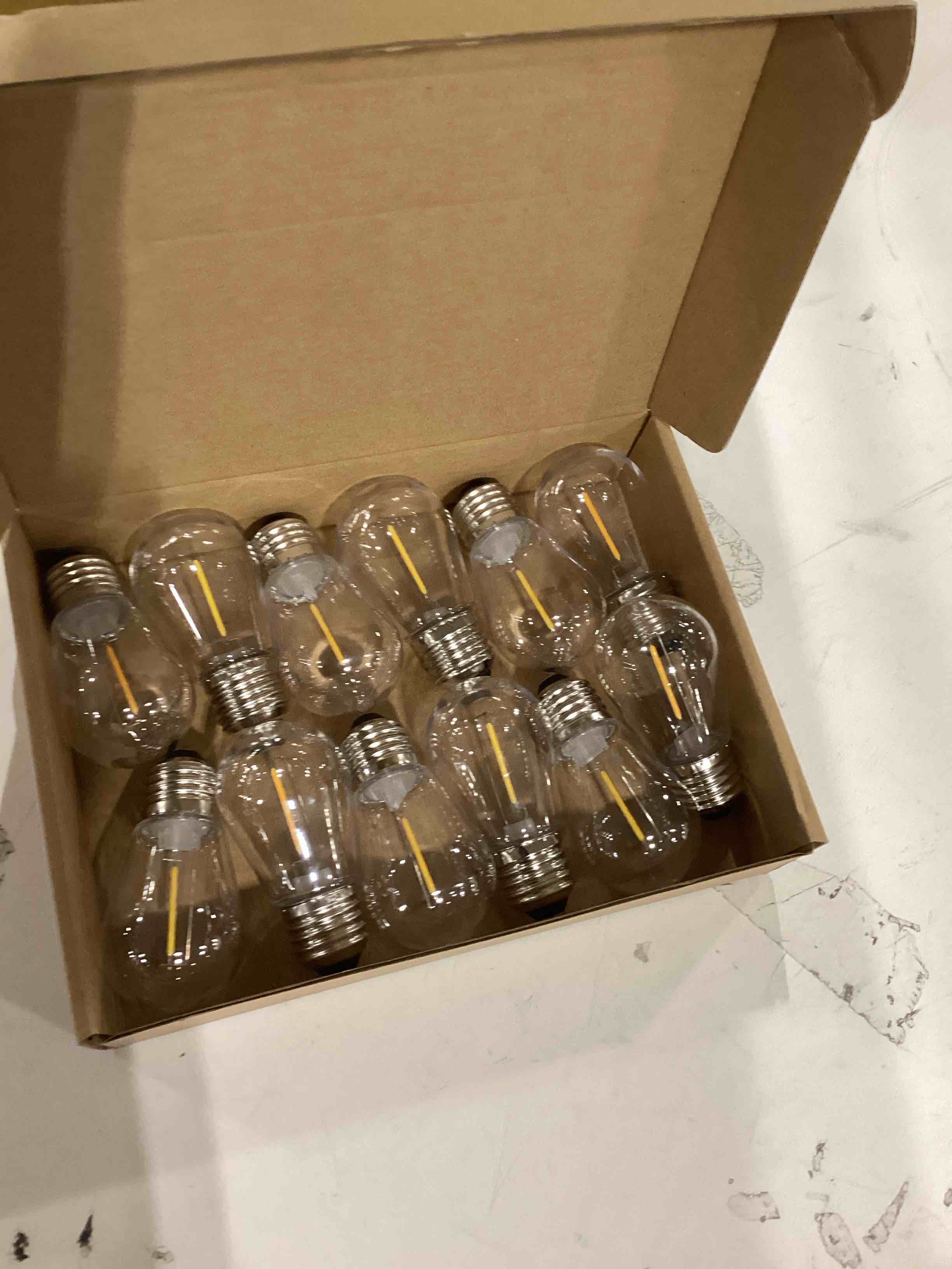 Condition photo showing As Is for Shatterproof LED String Lights, Waterproof, Warm White 2200K, 70LM, E26 Base - 15 Pack S14 15pack