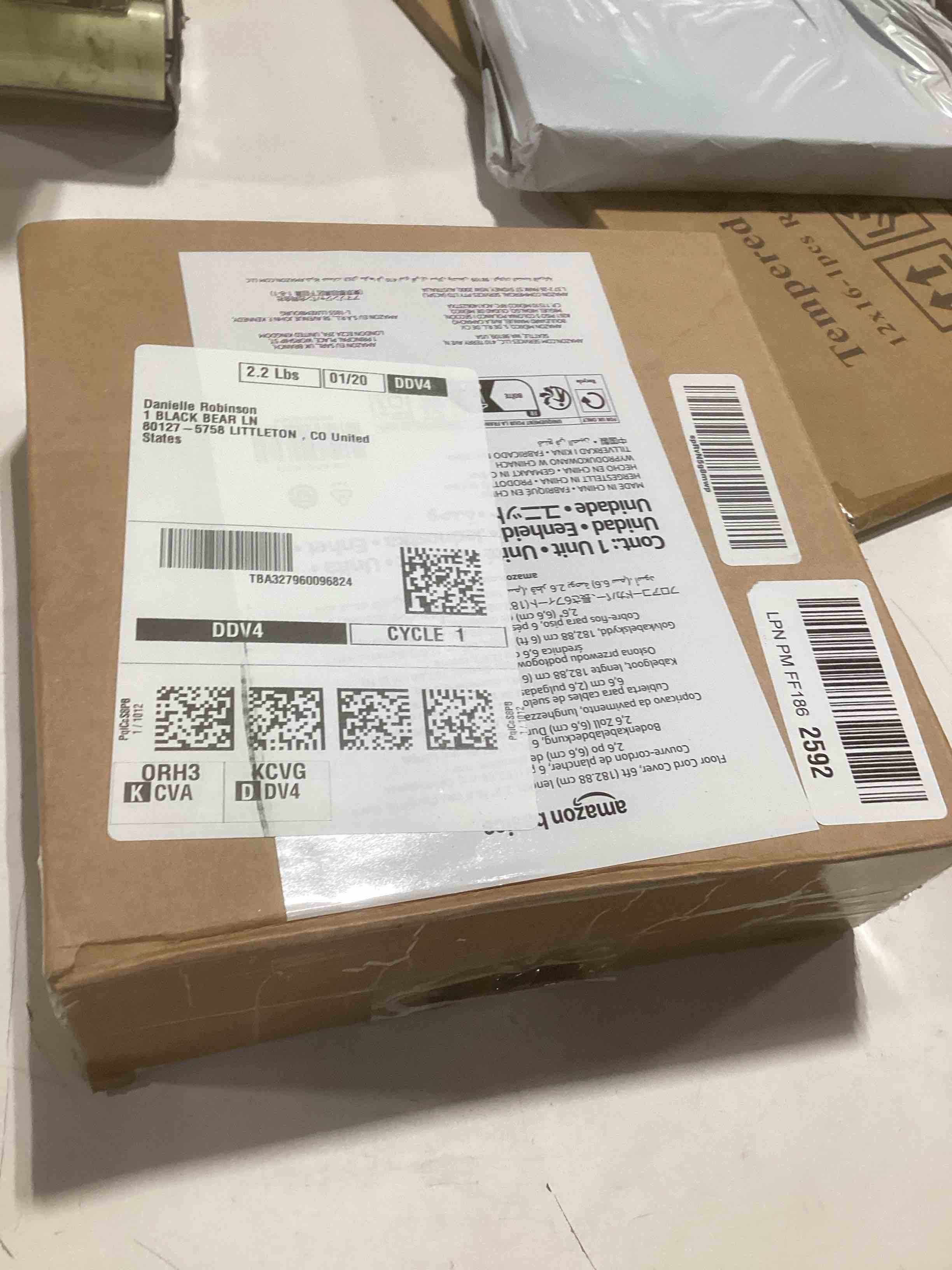 Condition photo showing Good Condition for Amazon Basics Floor Cord Cover, 6ft Length, 2.6" Diameter, 1-Channel PVC Cable Protector, Holds 1 Ethernet or 2 Small Power Cords, Cut-to-Size, Black, for Offices, Warehouses, Events