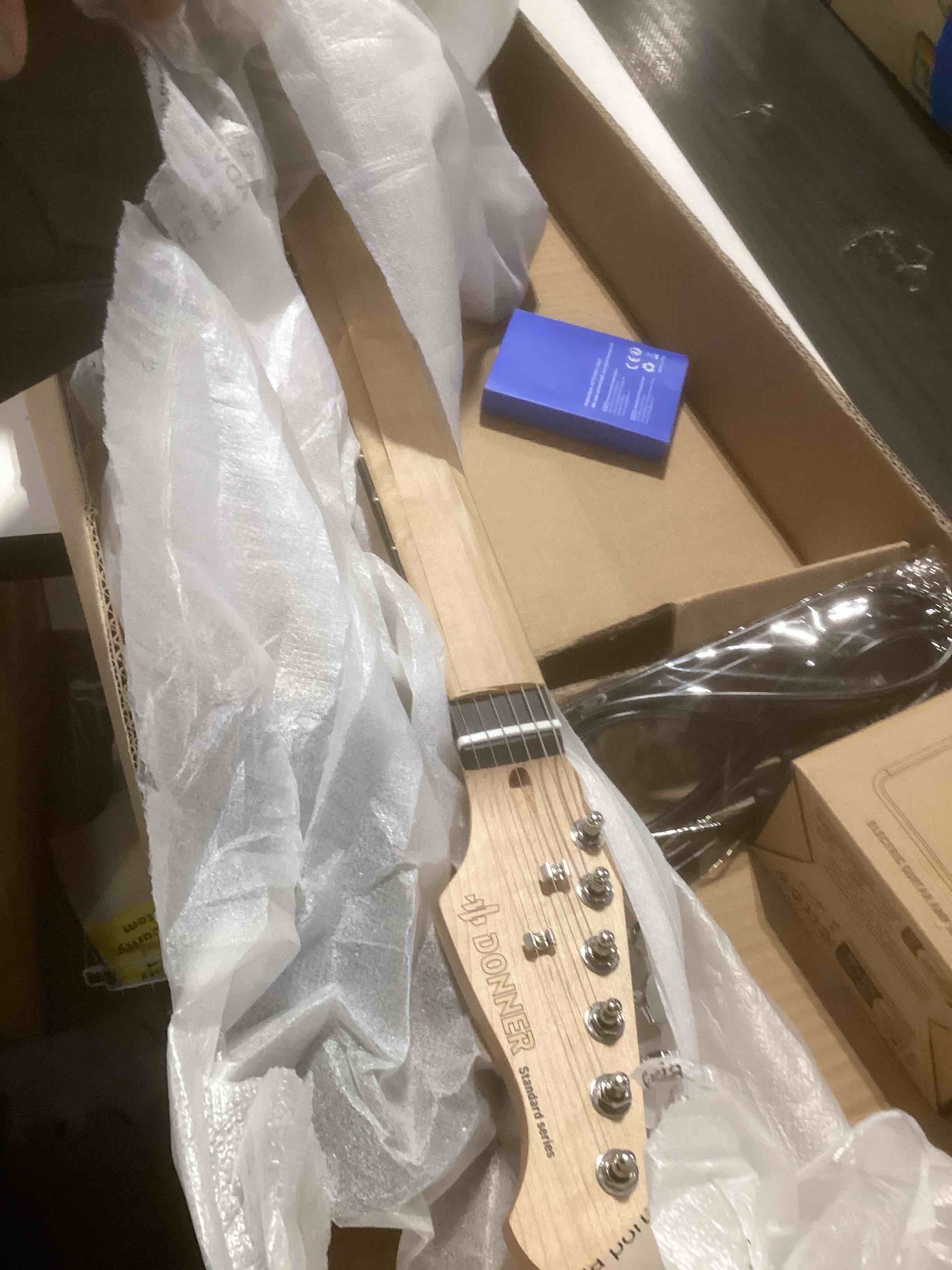 Condition photo showing Good Condition for Donner DST-100B 39 Inch Electric Guitar Beginner Kit Solid Body Full Size Black HSS for Starter, with Amplifier, Bag, Digital Tuner, Capo, Strap, String,Cable, Picks Black 39" Right Handed