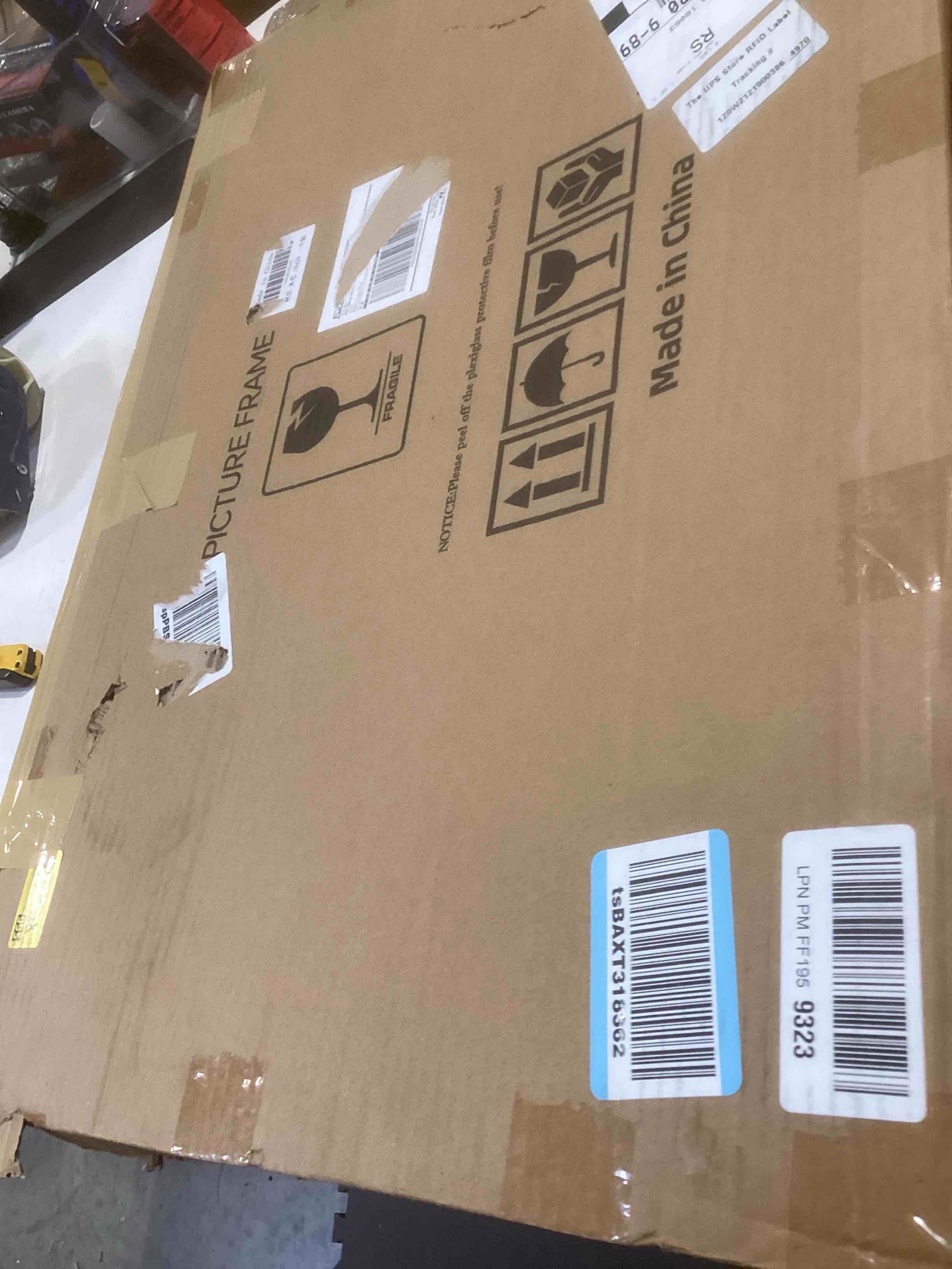 Condition photo showing As Is for VNVNK 16x24 Frame Natural Wood Color, Perfect for 16x24 Inch Picture without Mat or 14x20 Inch Picture with Mat, Home Wall Decor Picture Frame-1 PCS 16x24 Natural