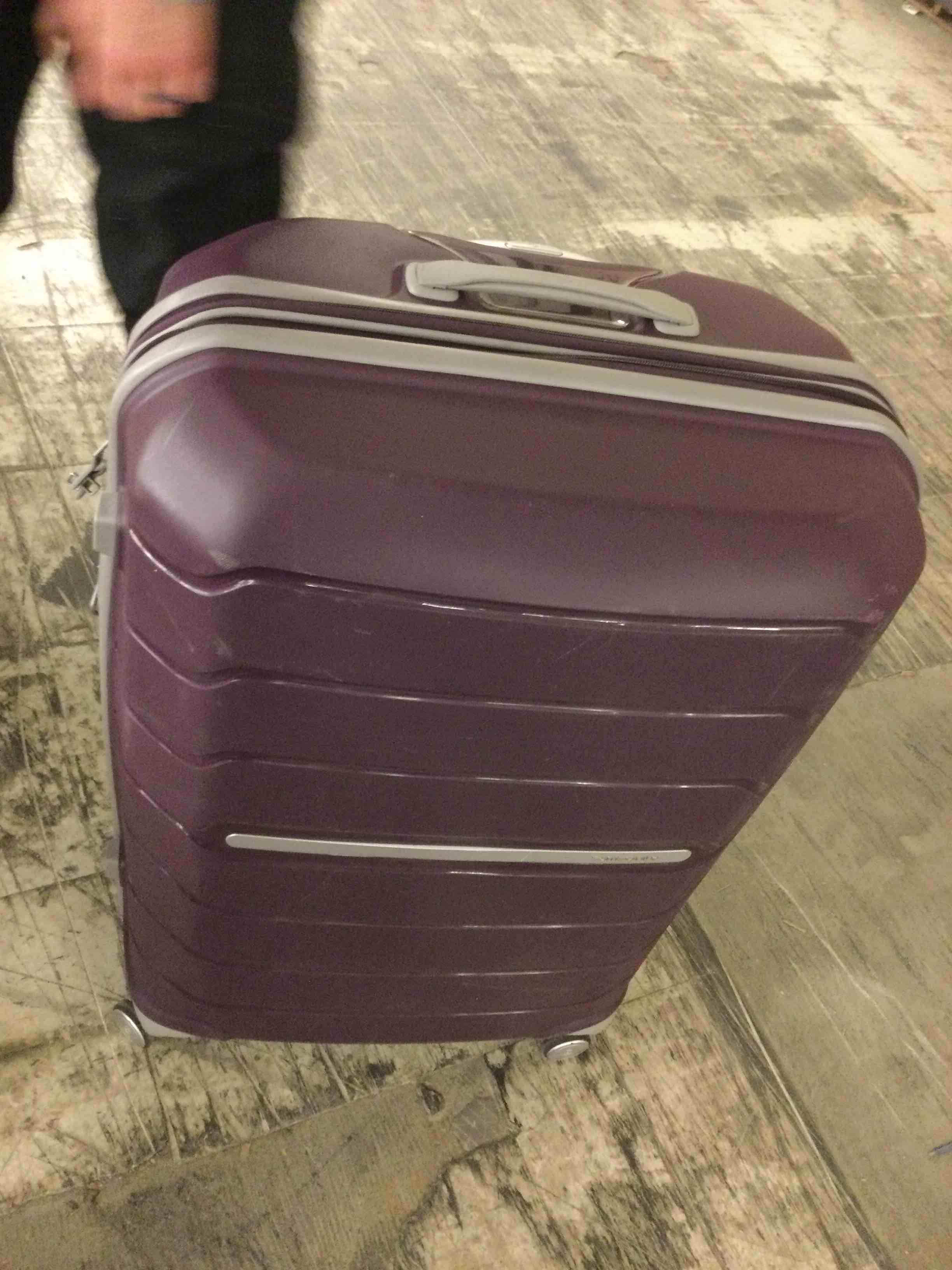 Condition photo showing As Is for Purple Samsonite Suitcase