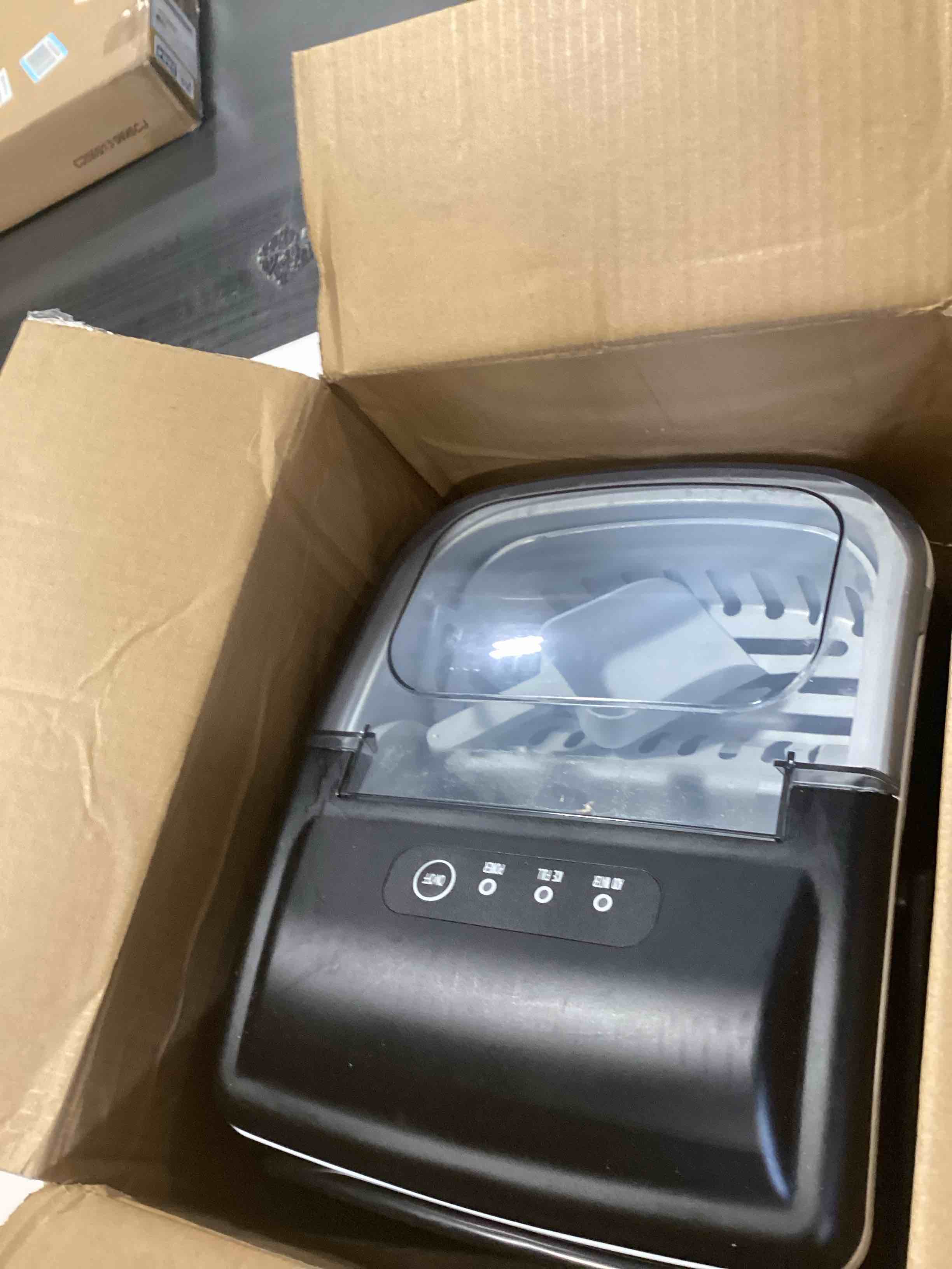 Condition photo showing Good Condition for EUHOMY Countertop Ice Maker Machine with Handle, 26lbs in 24Hrs, 9 Ice Cubes Ready in 6 Mins, Auto-Cleaning Portable Ice Maker with Basket and Scoop, for Home/Kitchen/Camping/RV. (Black) Black 26lbs