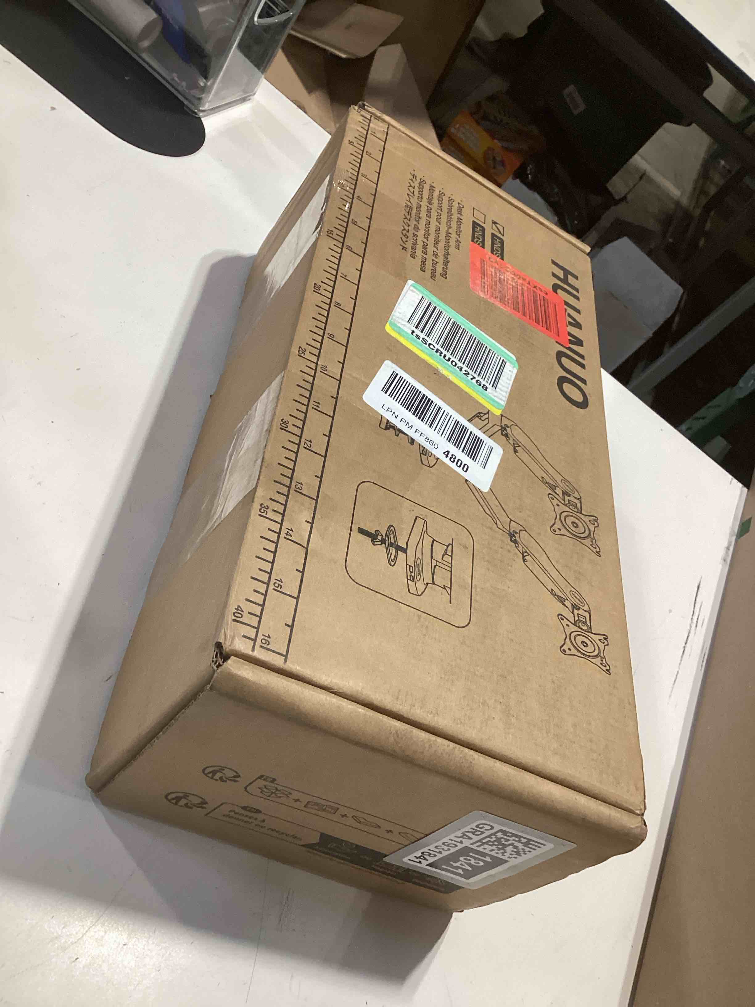 Condition photo showing Good Condition for HUANUO Dual Monitor Stand, Fully Adjustable Gaming Monitor Desk Mount for 13–32? Computer Screens, Full Motion VESA 75x75/100x100 with C-Clamp & Grommet Base, Each Arm Holds 4.4 to 19.8 lbs Black 13-32 Inch