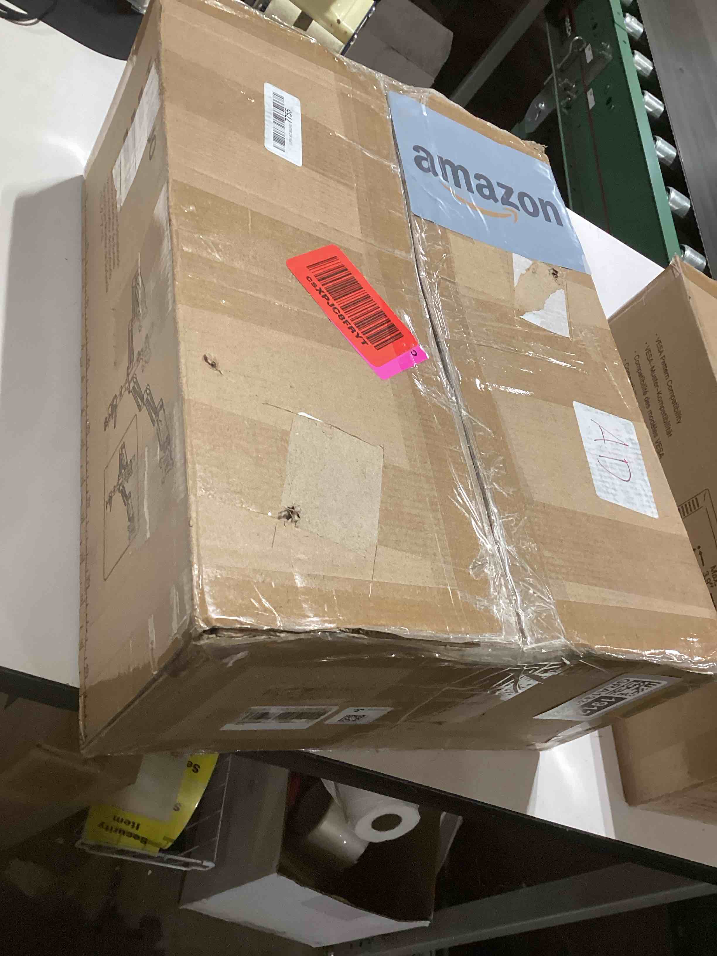 Condition photo showing Good Condition for HUANUO Triple Monitor Mount for 17 to 32 inch Screens, Adjustment Gaming Triple Monitor Stand with Swivel, Tilt, Rotation, Clamp & Grommet Kit Black