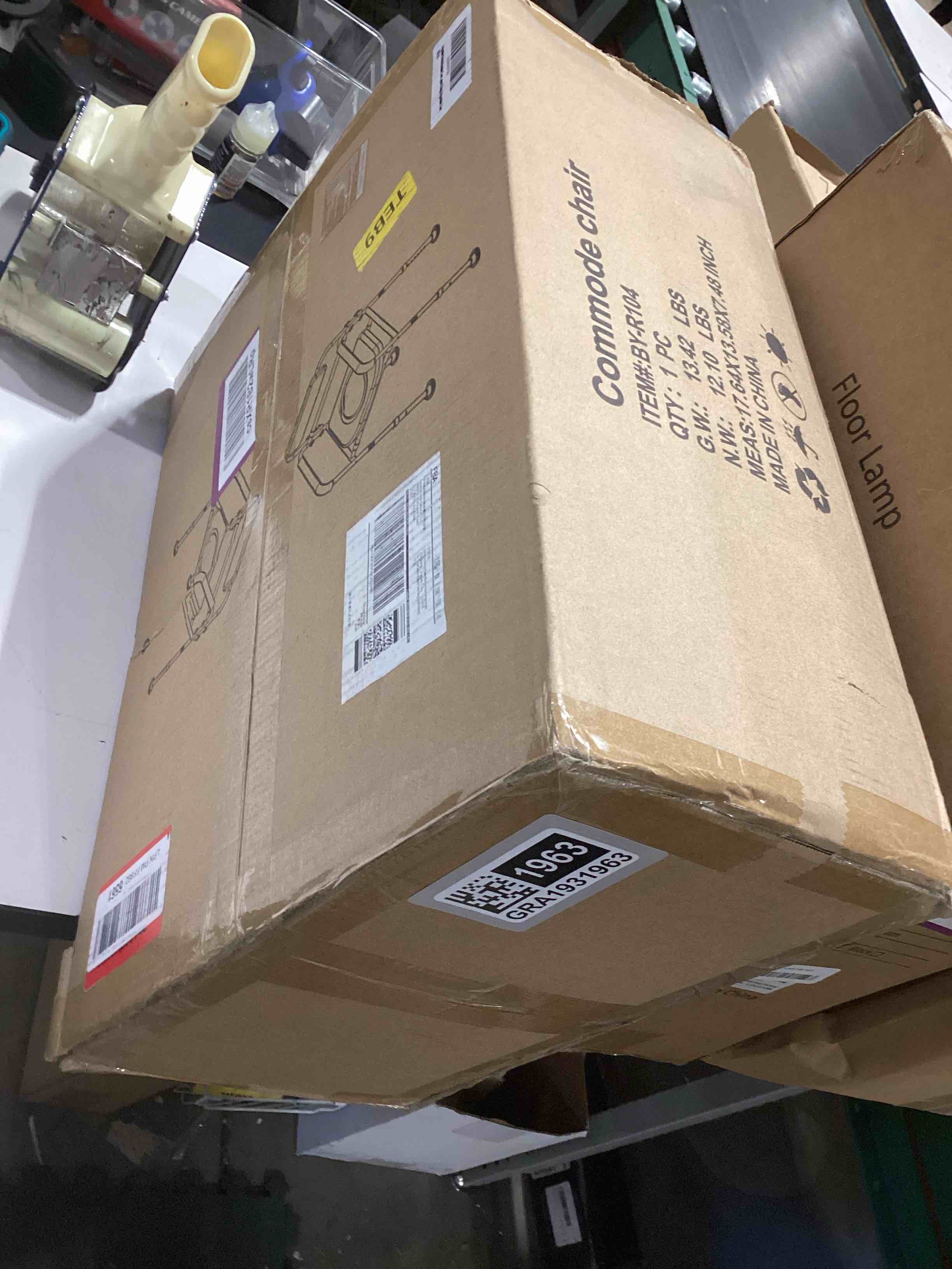 Condition photo showing Good Condition for Adjustable Medical Bedside Commode Chair with Padded Backrest, Height Adjustable, Drop Arm Support Gray modified commode chair