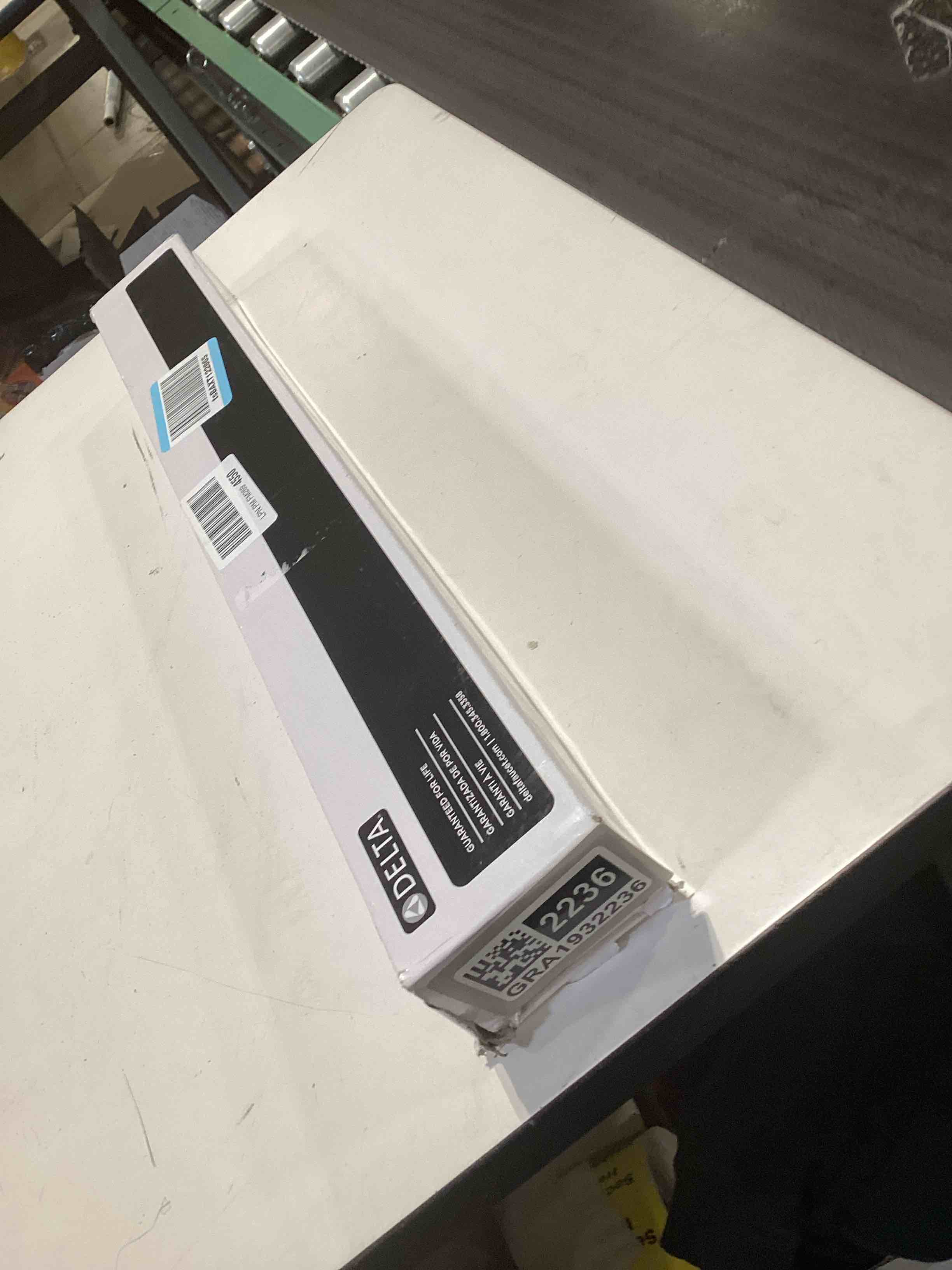 Condition photo showing As Is for DELTA FAUCET 73224-SS Woodhurst 24 in. Wall Mount Towel Bar Bath Hardware Accessory in Stainless Steel 24 Inch Brilliance Stainless Steel