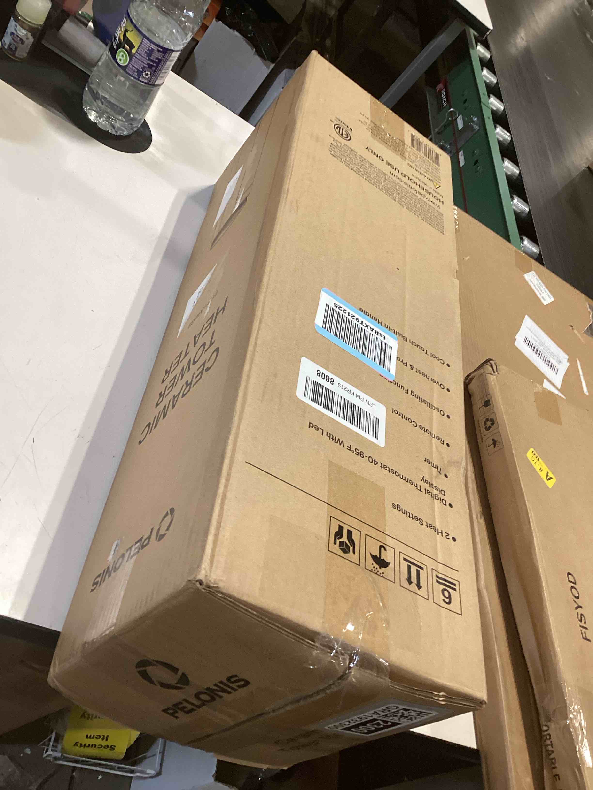 Condition photo showing As Is for PELONIS PTH15A4BGB Ceramic Tower 1500W Indoor Space Heater with Oscillation, Remote Control, Programmable Thermostat & 8H Timer, ECO Mode, Tip-Over Switch & Overheating Protection, Gray Grey