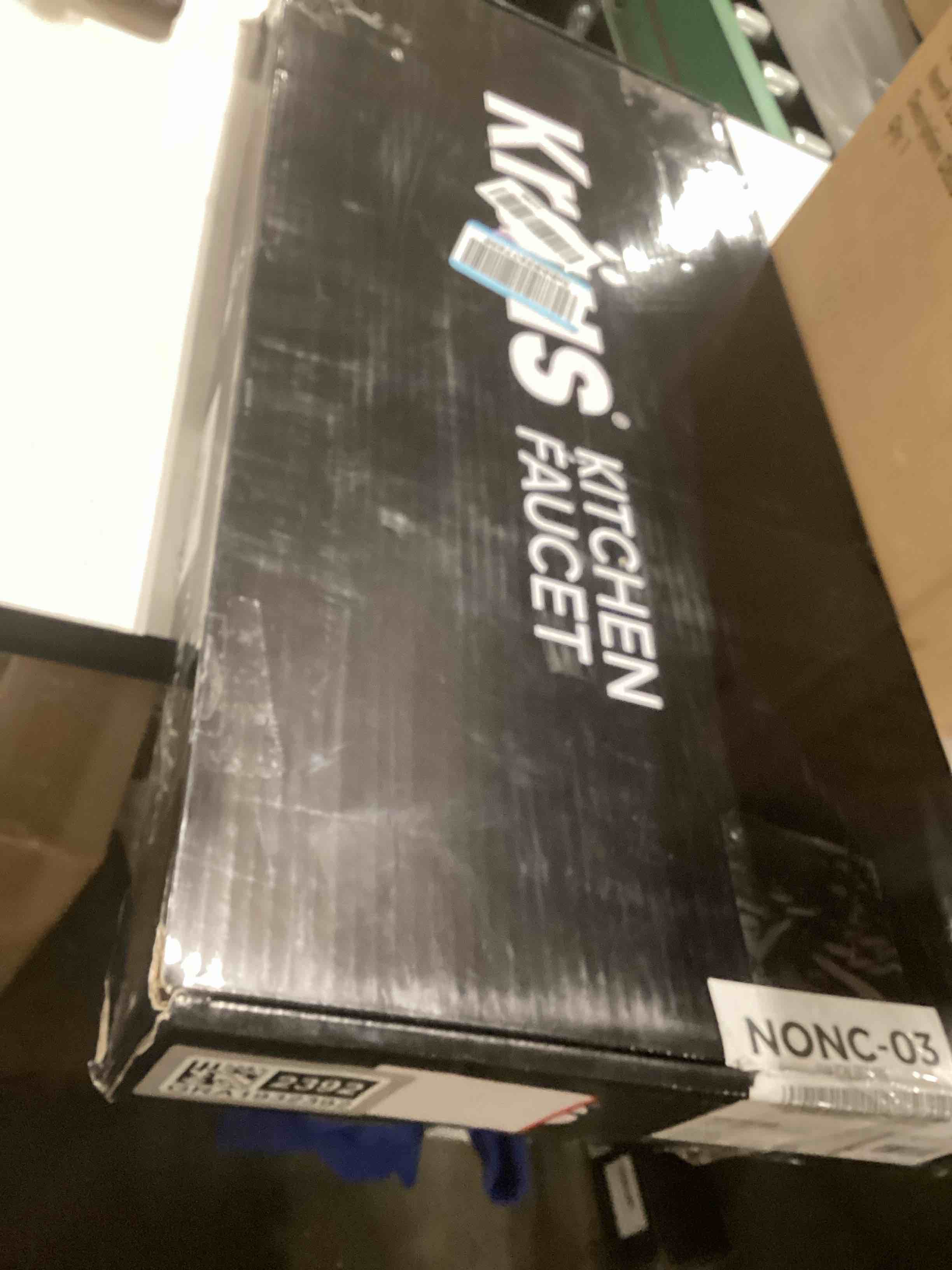 Condition photo showing As Is for KRAUS Oletto High-Arc Single Handle Pull-Down Kitchen Faucet in Brushed Brass, KPF-2821BB Brushed Bronze 21 Inch High Arc Faucet