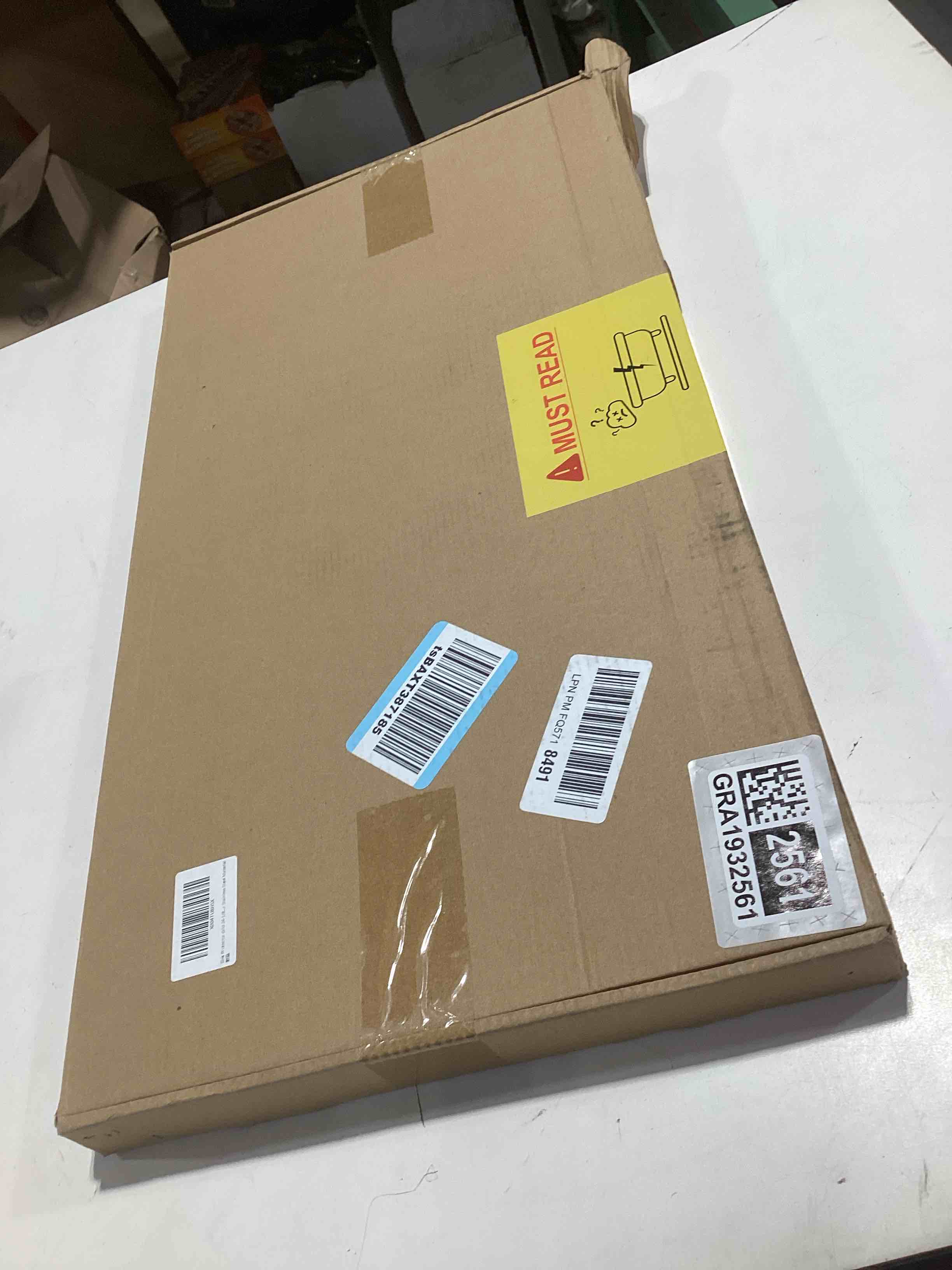 Condition photo showing Good Condition for Sink Protector Grid 24-1/8" x 12-5/8", Centered Drain with Corner Radius 1-1/2", Sink Protector Stainless Steel Material for Single Bowl 24-1/8" x 12-5/8" Centered Drain