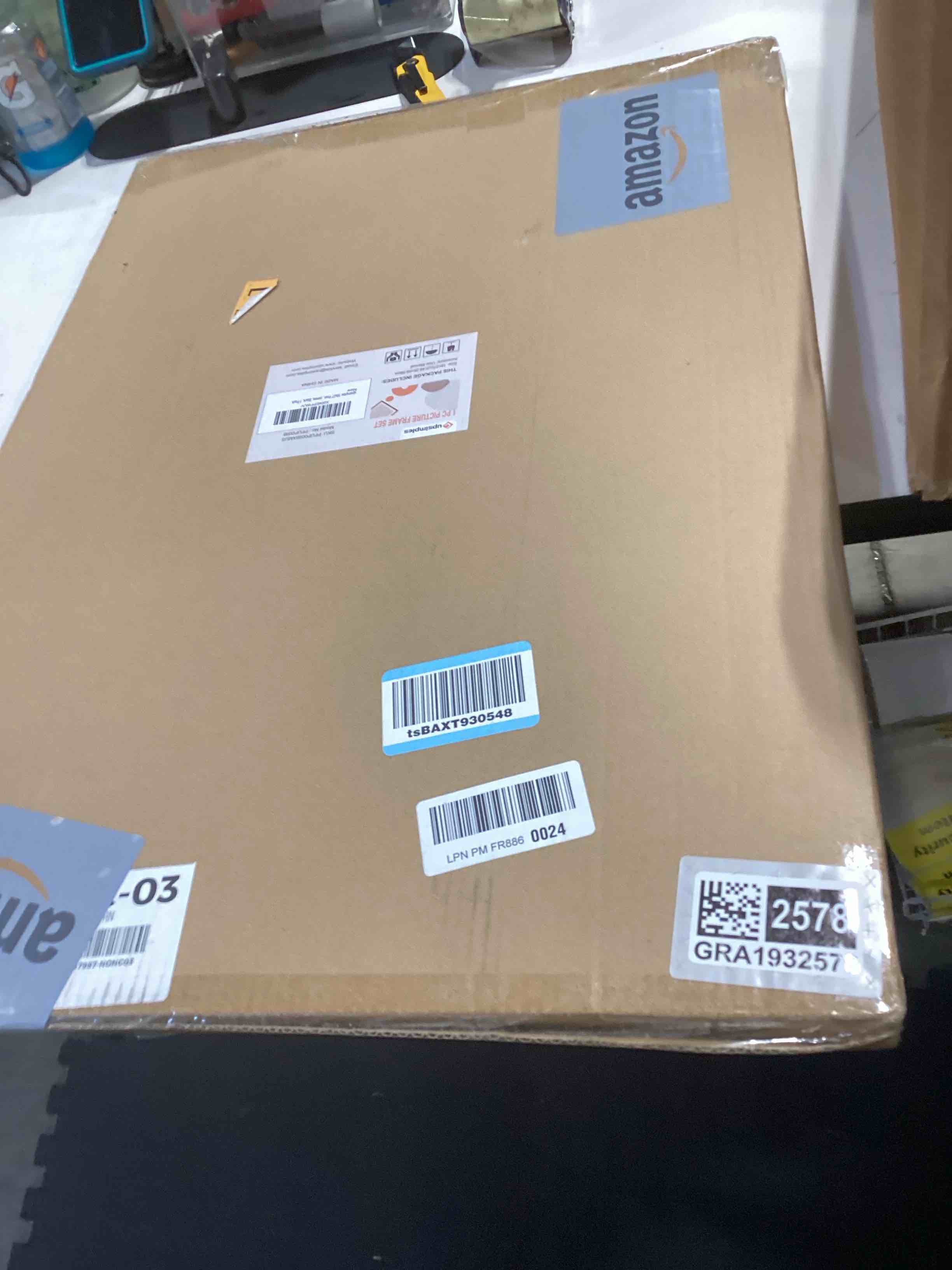 Condition photo showing Good Condition for upsimples 19x27 Poster Frame, Display Pictures 13x19 with Mat or 19 x 27 Without, Wall Hanging Puzzle Frames, Black, 1 Pack Black 19x27