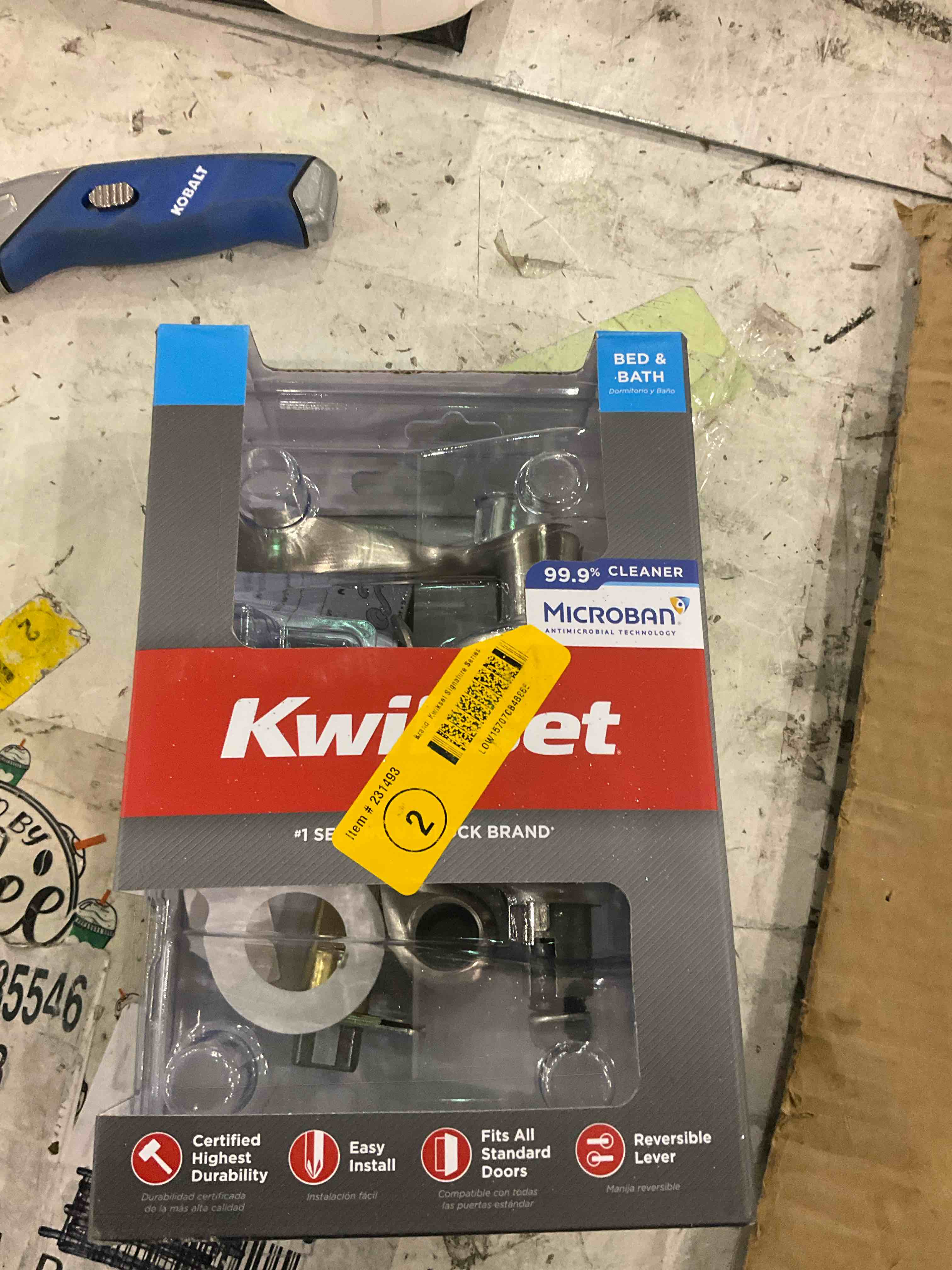Kwikset door handle reversible lever