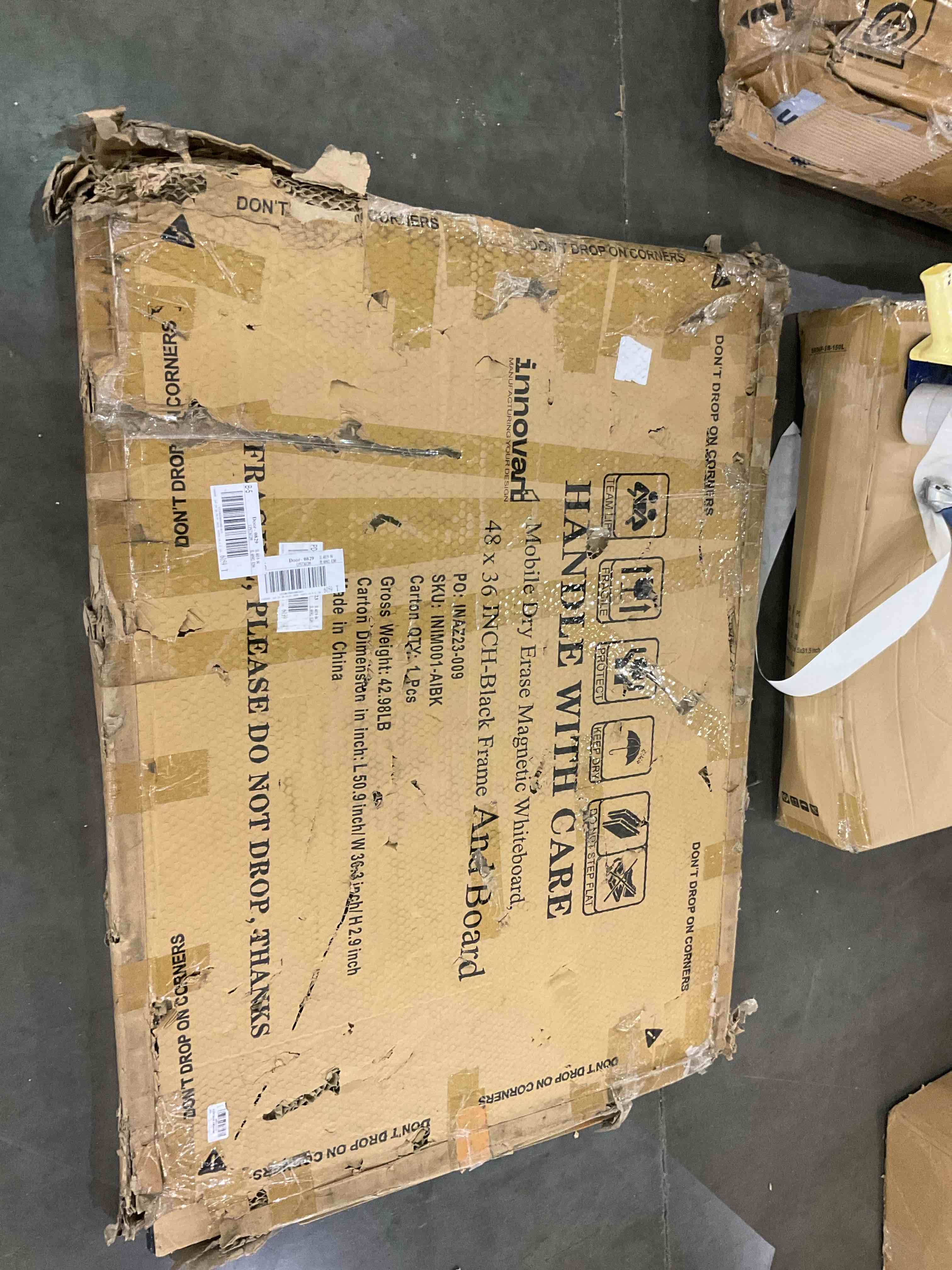 48-36 in black frame and board 