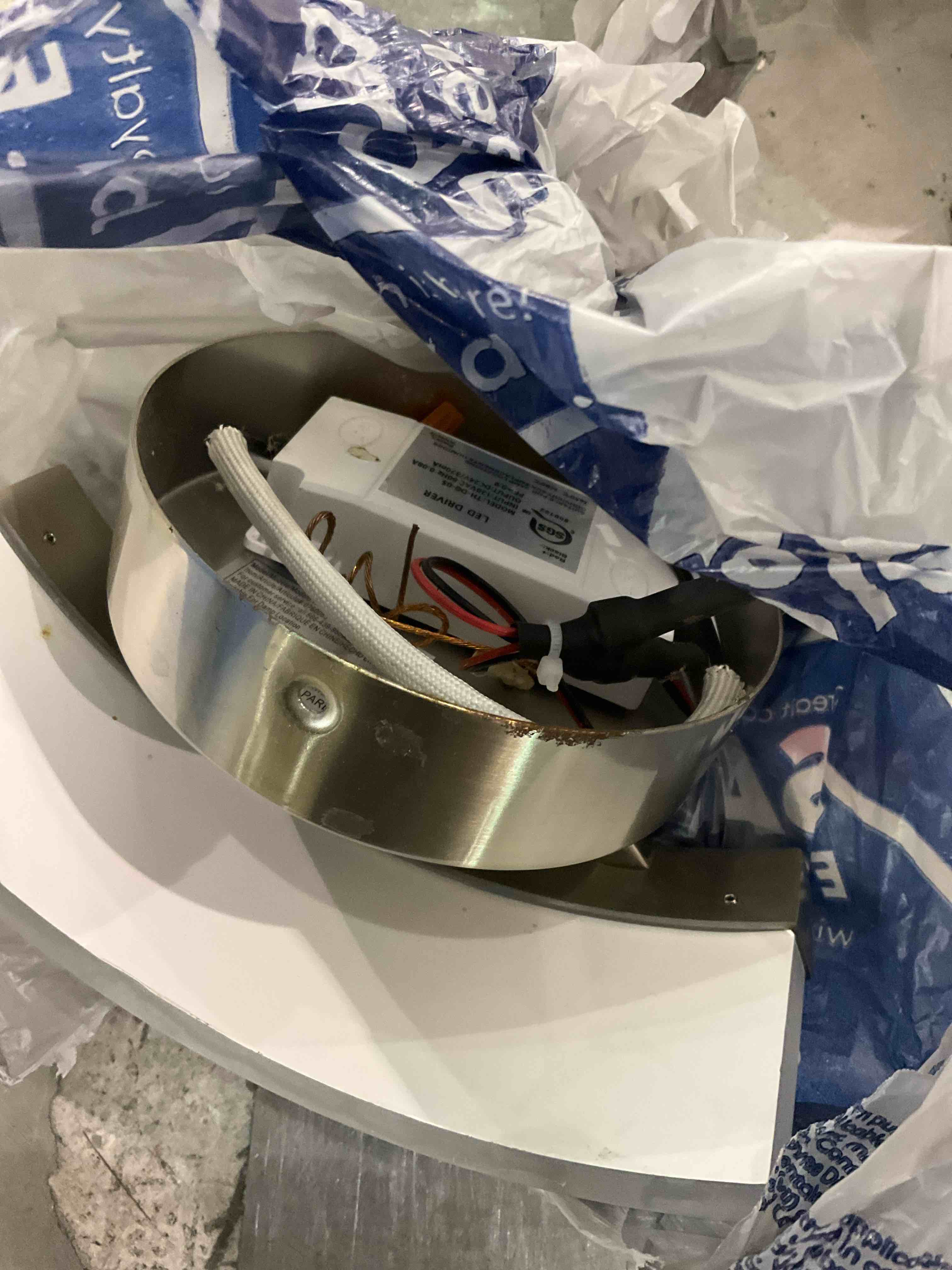 Condition photo showing As Is for light fixture 