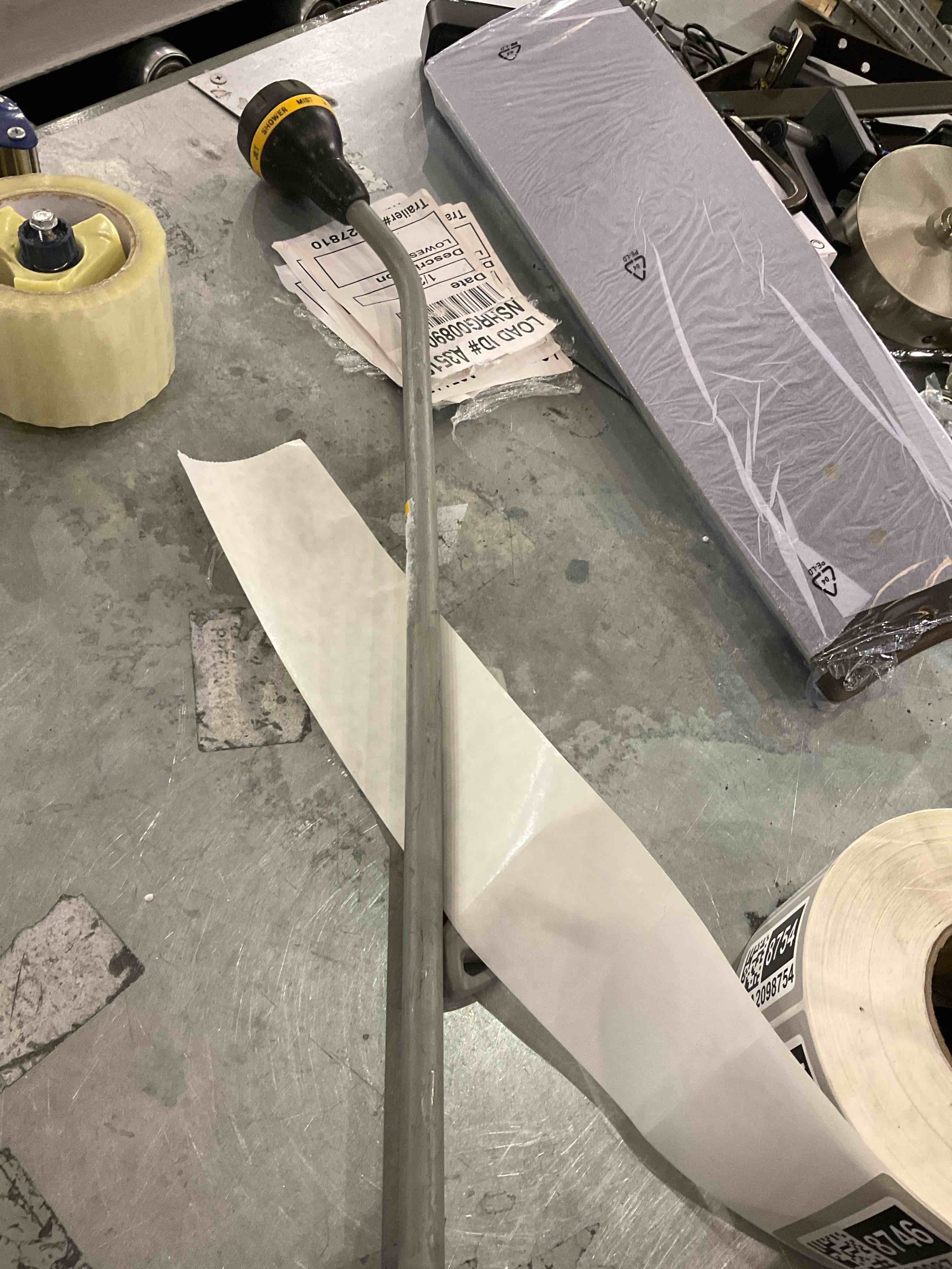 Condition photo showing As Is for shower nozzle extension wand