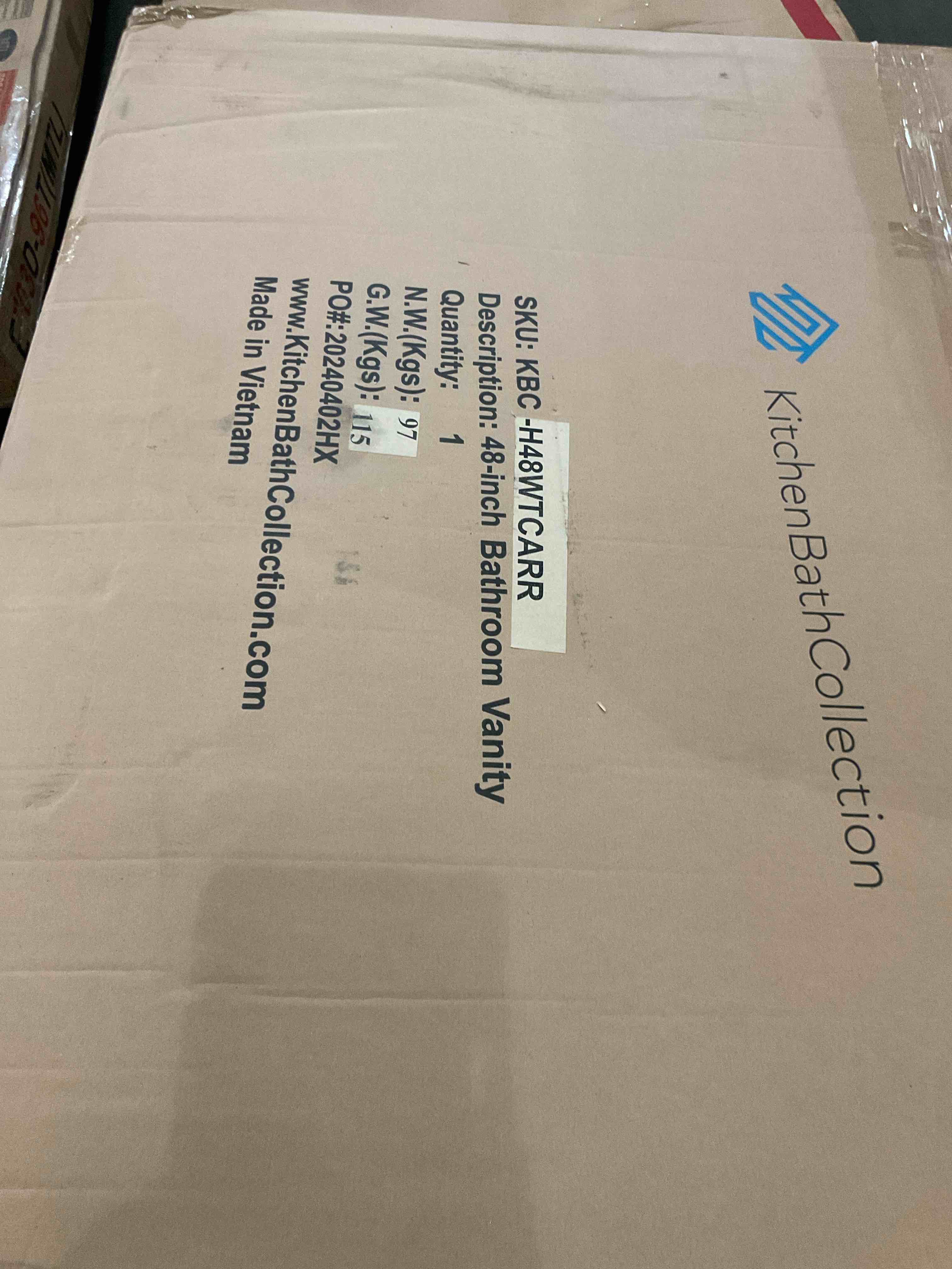 white 48-inch bathroom vanity with stone top