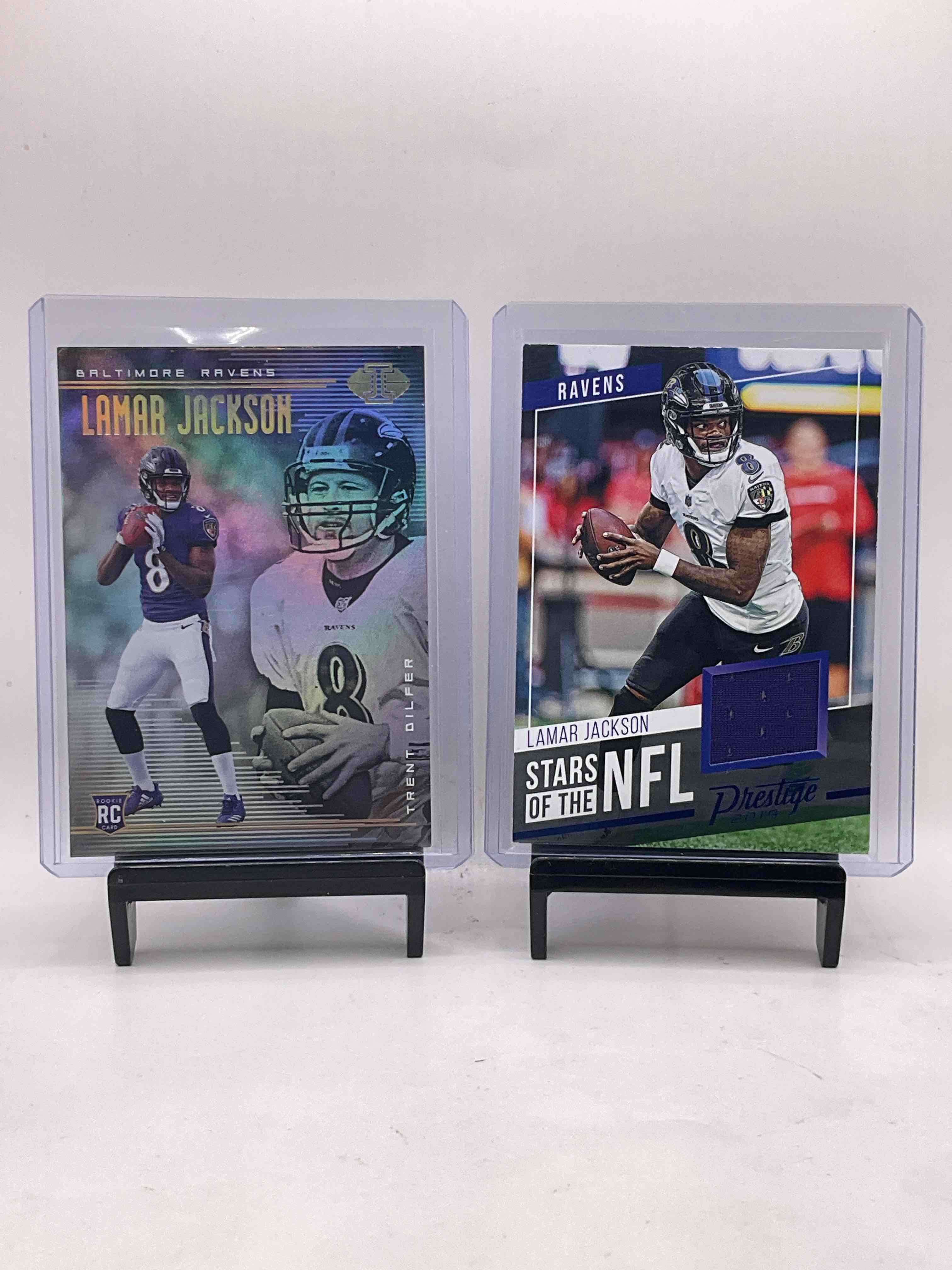 Action Jackson! Rookie, Player Worn Jersey Card & More! Lamar Jackson Illusions Combo Rookie Card, Prestige Player Worn Card, Select 2020, Donruss, Score & Mosaic! Insane Action Jackson Cards!
