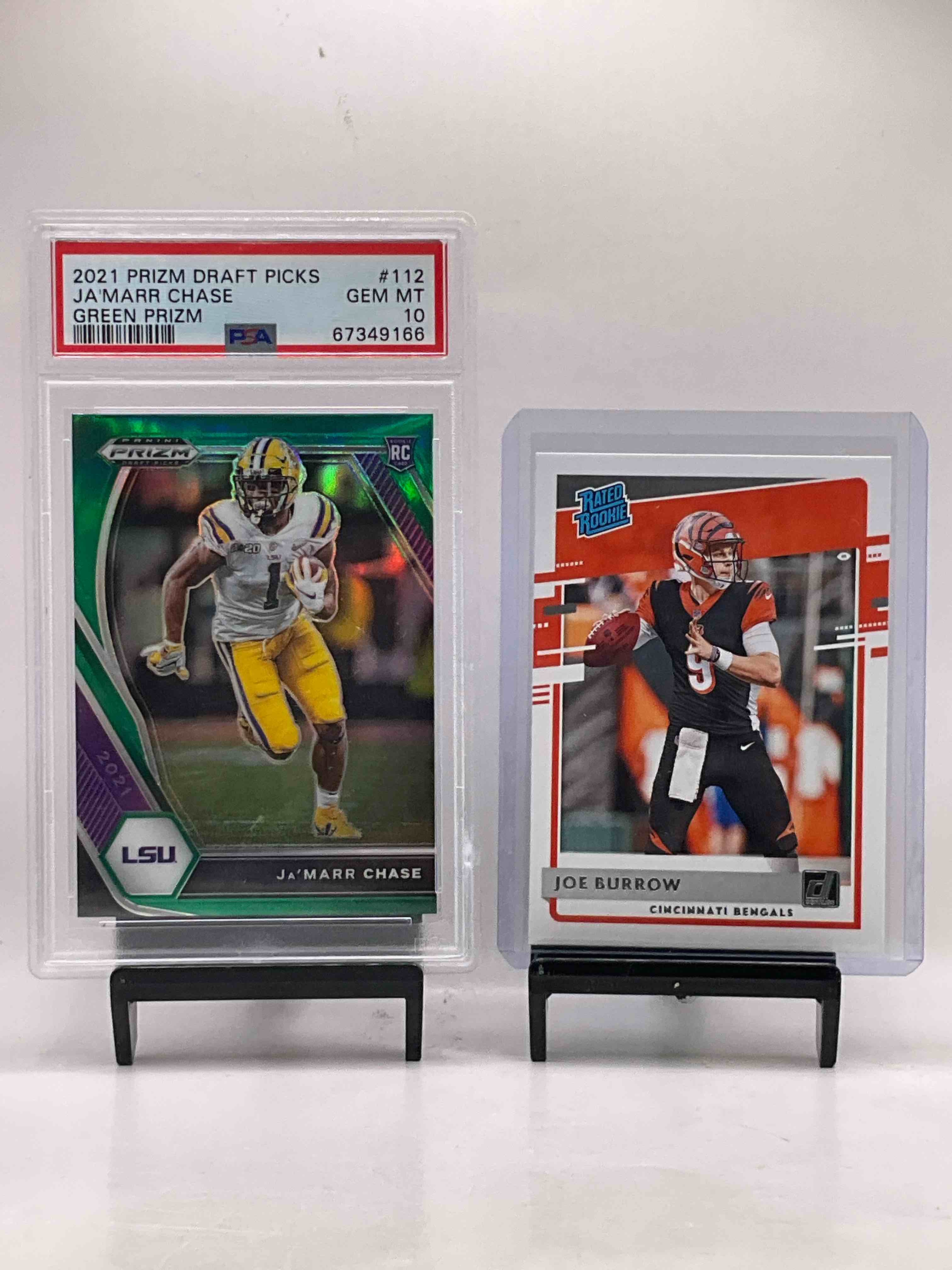 Perfect Condition Ja’marr Chase Green PRIZM Rookie Card… Gem Mint 10! Also, Joe Burrow Donruss Rated Rookie Card Along With Other Bengals! 50 Card Lot! Bengals Stars, Mixon, Chase, Evans, Burrow & More! Vintage & Modern!