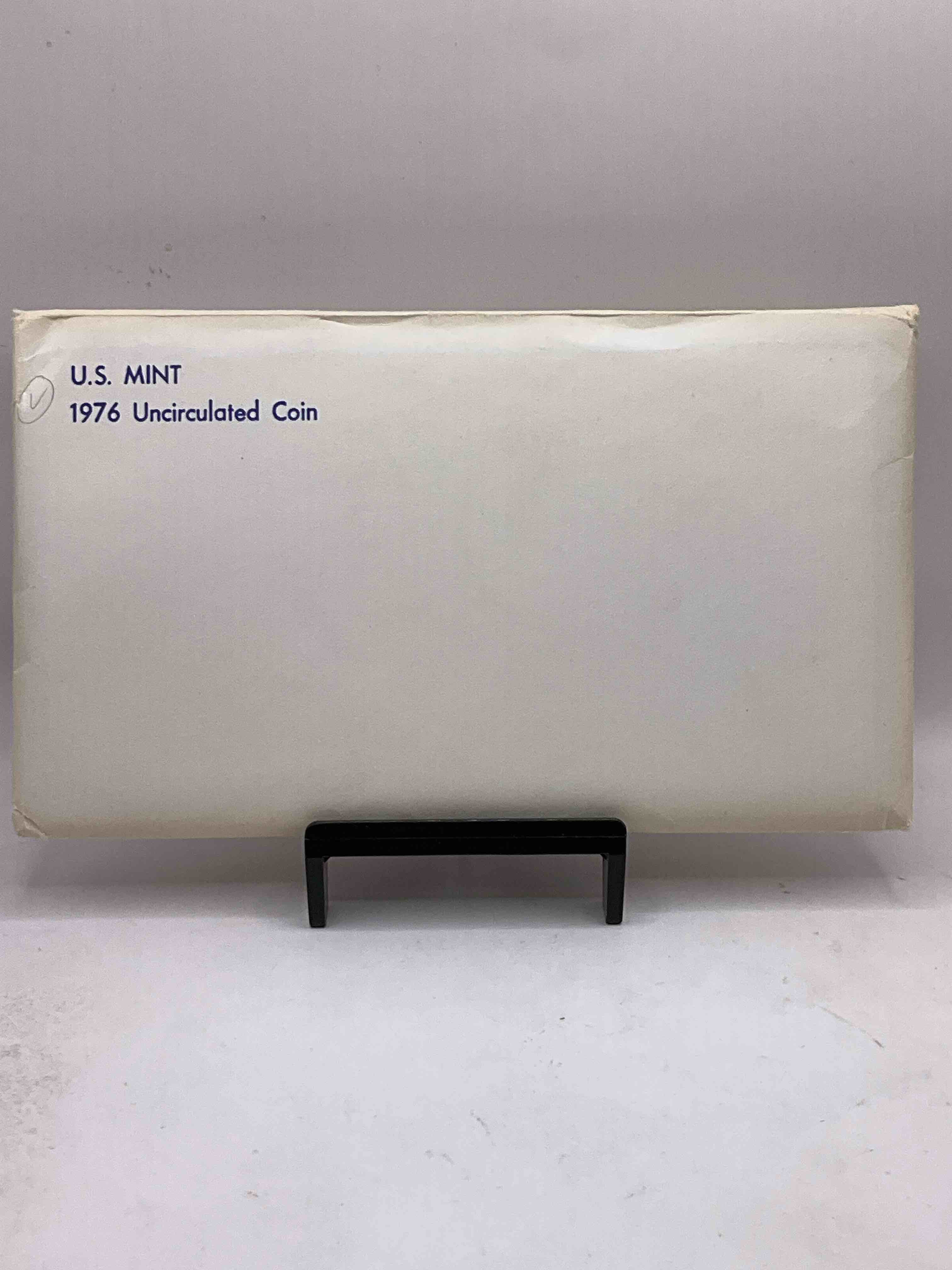 1976 Bicentennial Mint Set! This Highly Collectible Mint Set Includes 10 Coins, Five Minted From Each Mint Location (Philly & Denver) That Year. Coins Are 1976 Special Bicentennial Edition, To Include Rare Bicentennial "Ike" Dollar! Still In Its Original Envelope Direct From The U.S. Treasury in 1976