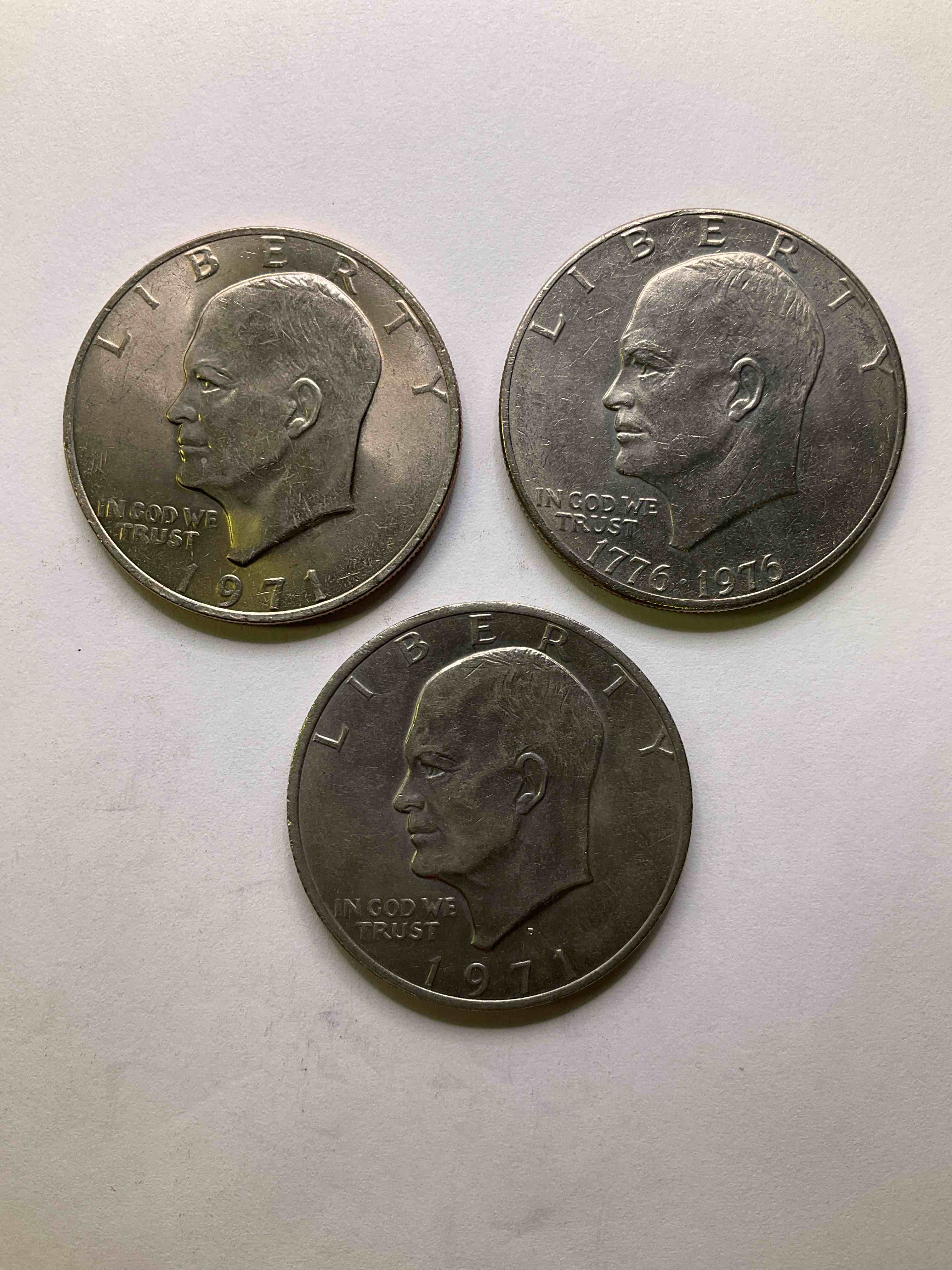 Eisenhower Dollar Coins! These Striking, Large U.S. Coins Were Minted From 1971-1978. Here Are Gorgeous Of Examples Of "Ike" Dollars In Varying Years. Includes The Highly Collectible 1976 Bicentennial Version. These Coins Have Become Immensely Popular With Collectors & Some Have Great Toning!