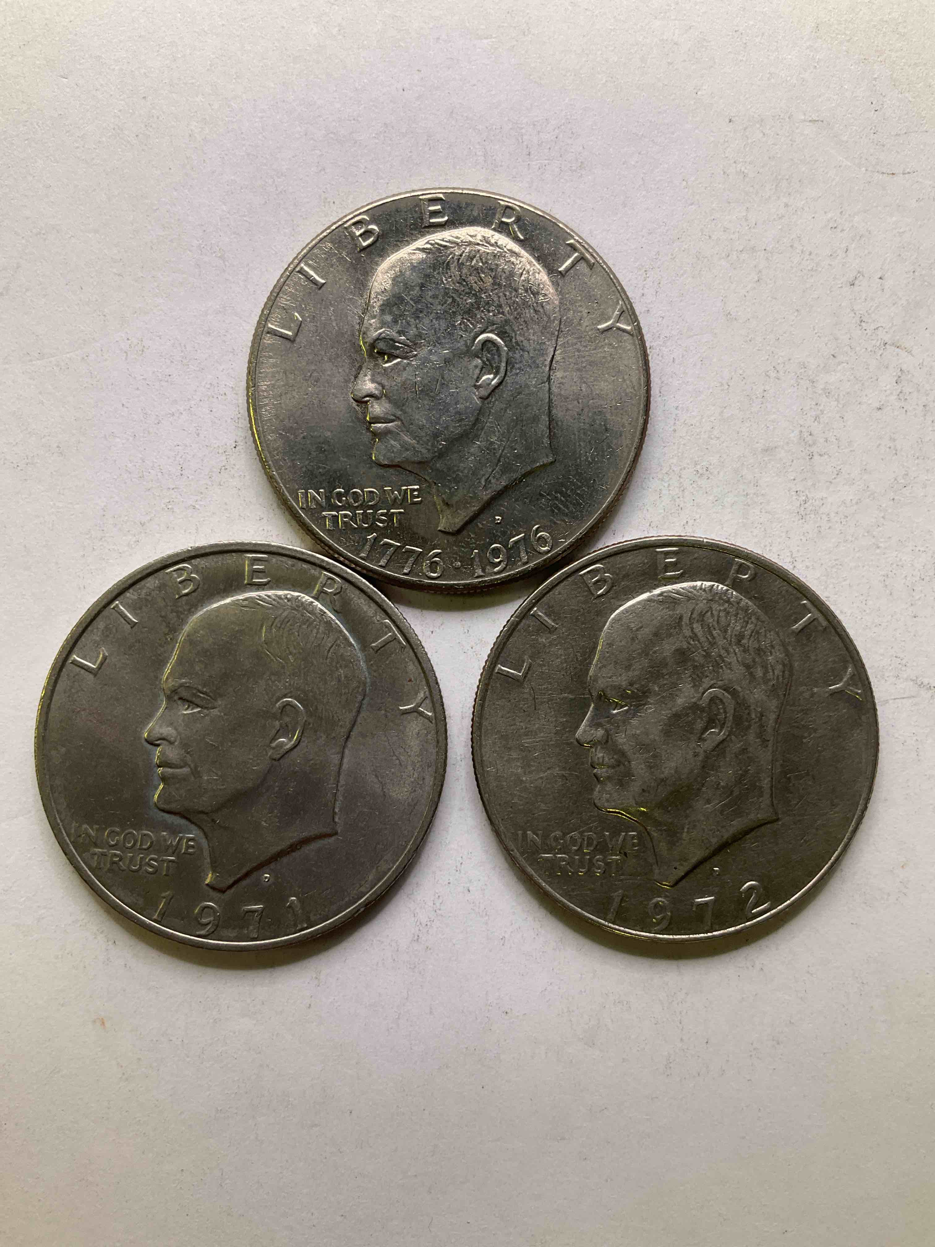 Eisenhower Dollar Coins! These Striking, Large U.S. Coins Were Minted From 1971-1978. Here Are Gorgeous Of Examples Of "Ike" Dollars In Varying Years. Includes The Highly Collectible 1976 Bicentennial Version. These Coins Have Become Immensely Popular With Collectors & Some Have Great Toning!