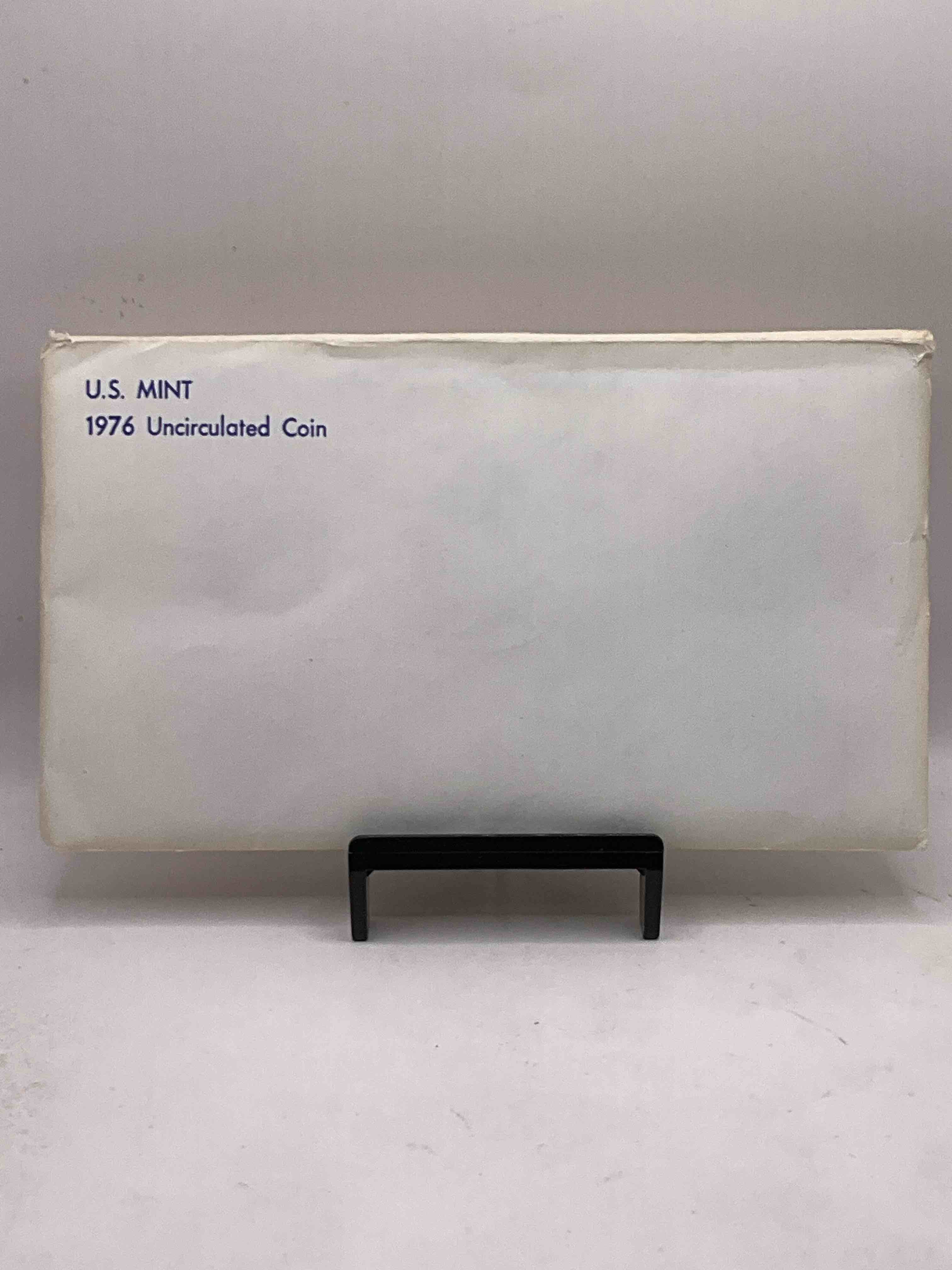 1976 Bicentennial Mint Set! This Highly Collectible Mint Set Includes 10 Coins, Five Minted From Each Mint Location (Philly & Denver) That Year. Coins Are 1976 Special Bicentennial Edition, To Include Rare Bicentennial "Ike" Dollar! Still In Its Original Envelope Direct From The U.S. Treasury in 1976!