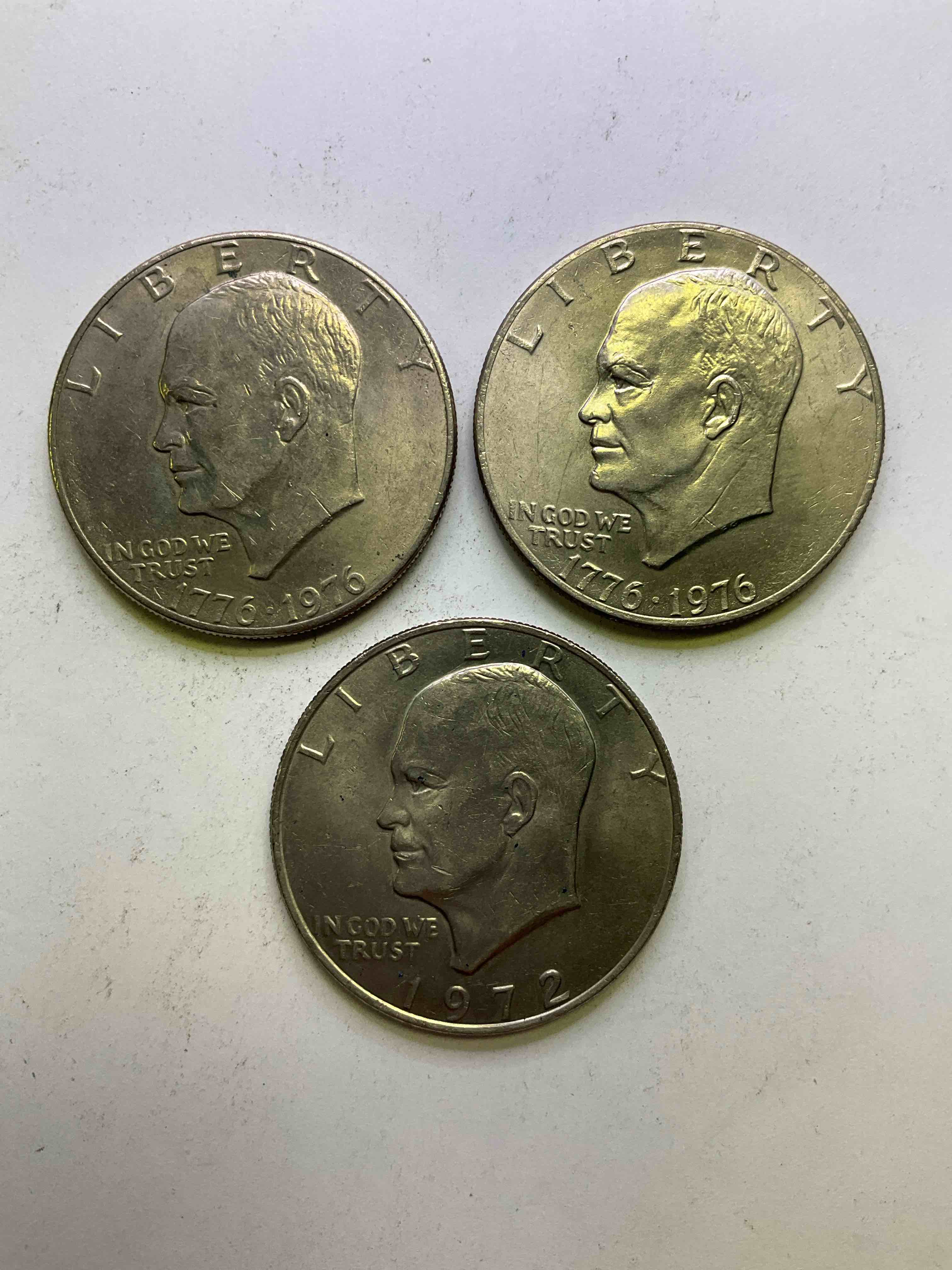 Eisenhower Dollar Coins! These Striking, Large U.S. Coins Were Minted From 1971-1978. Here Are Gorgeous Of Examples Of "Ike" Dollars In Varying Years. Includes The Highly Collectible 1976 Bicentennial Version. These Coins Have Become Immensely Popular With Collectors & Some Have Great Toning!