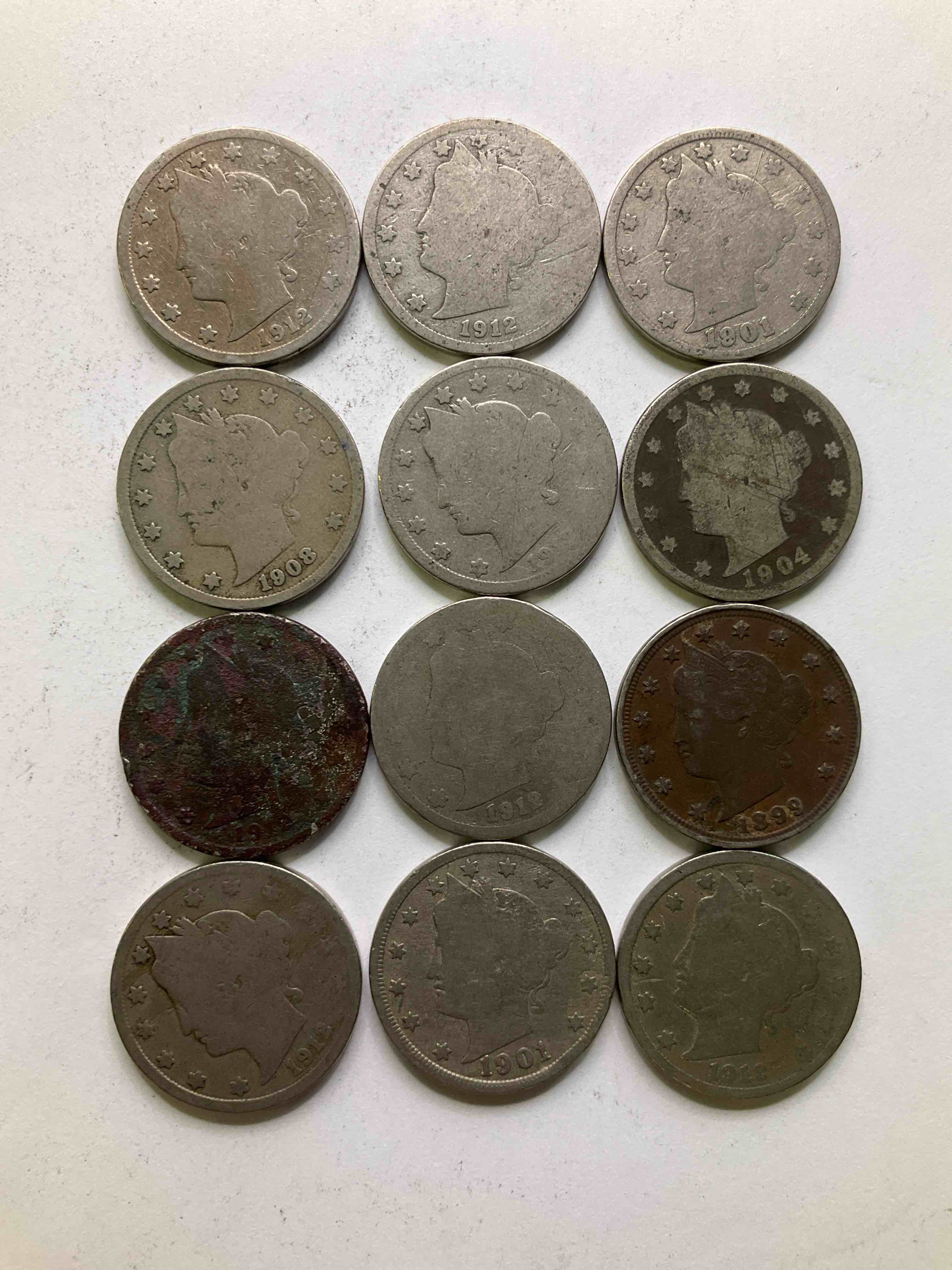 Antique U.S. "V" Nickels, 1912 Year Of The Titanic! Nearly Impossible To Collect! Antique V Nickels, Includes At Least One 1912, The Year Of The Sinking Of The Titanic! Own A Piece Of History Great For Coin Collectors, Think Of The History These Coins Have Seen! Liberty Head V Nickels Were Minted Up Until 1913 & Were The Style Of Nickels Before Buffalo Nickels. Own Some Cool Pieces Of History! Rare To See These Coins With The "Date On" In Circulated Condition!