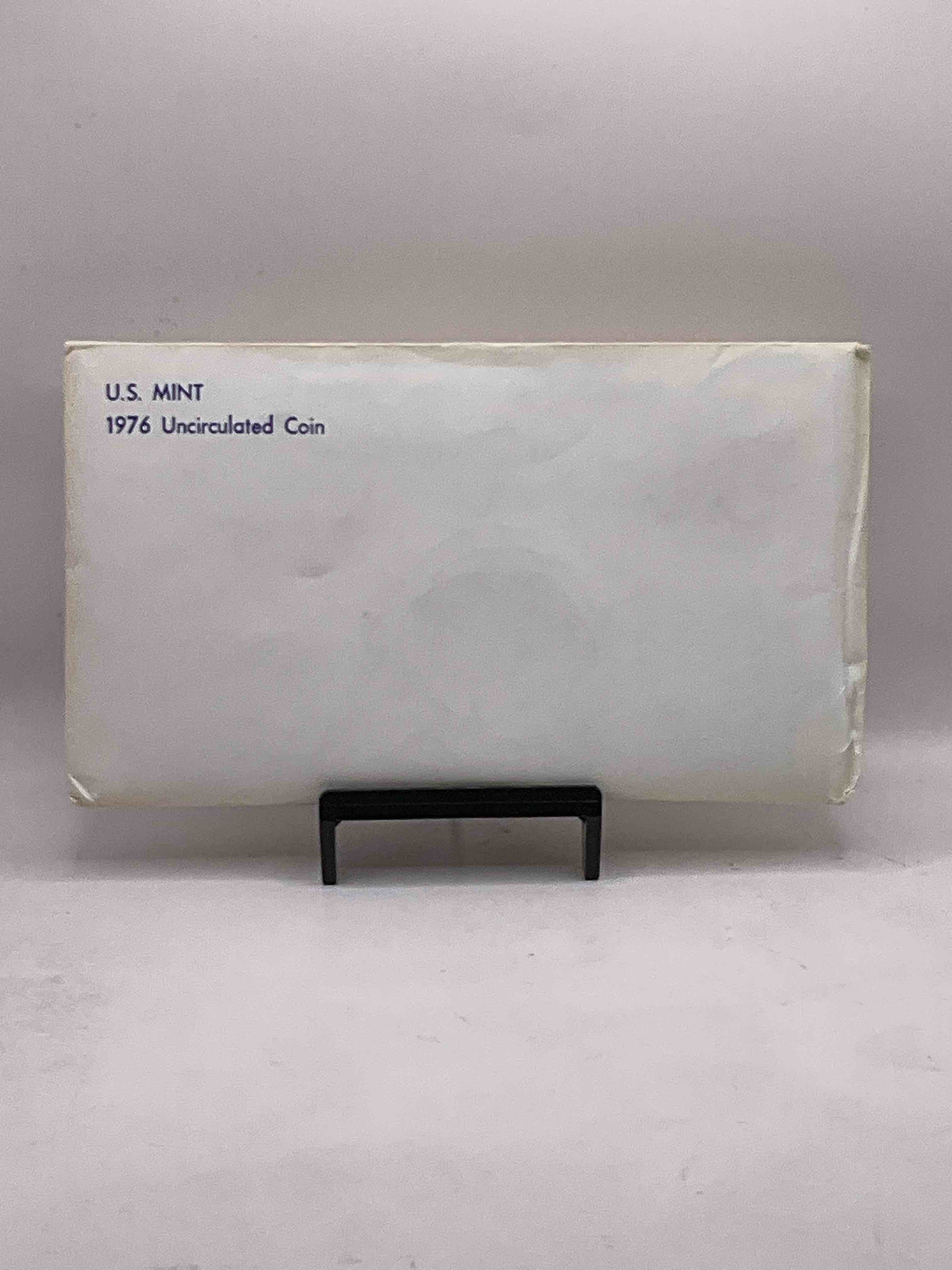 1976 Bicentennial Mint Set! This Highly Collectible Mint Set Includes 10 Coins, Five Minted From Each Mint Location (Philly & Denver) That Year. Coins Are 1976 Special Bicentennial Edition, To Include Rare Bicentennial "Ike" Dollar! Still In Its Original Envelope Direct From The U.S. Treasury in 1976!