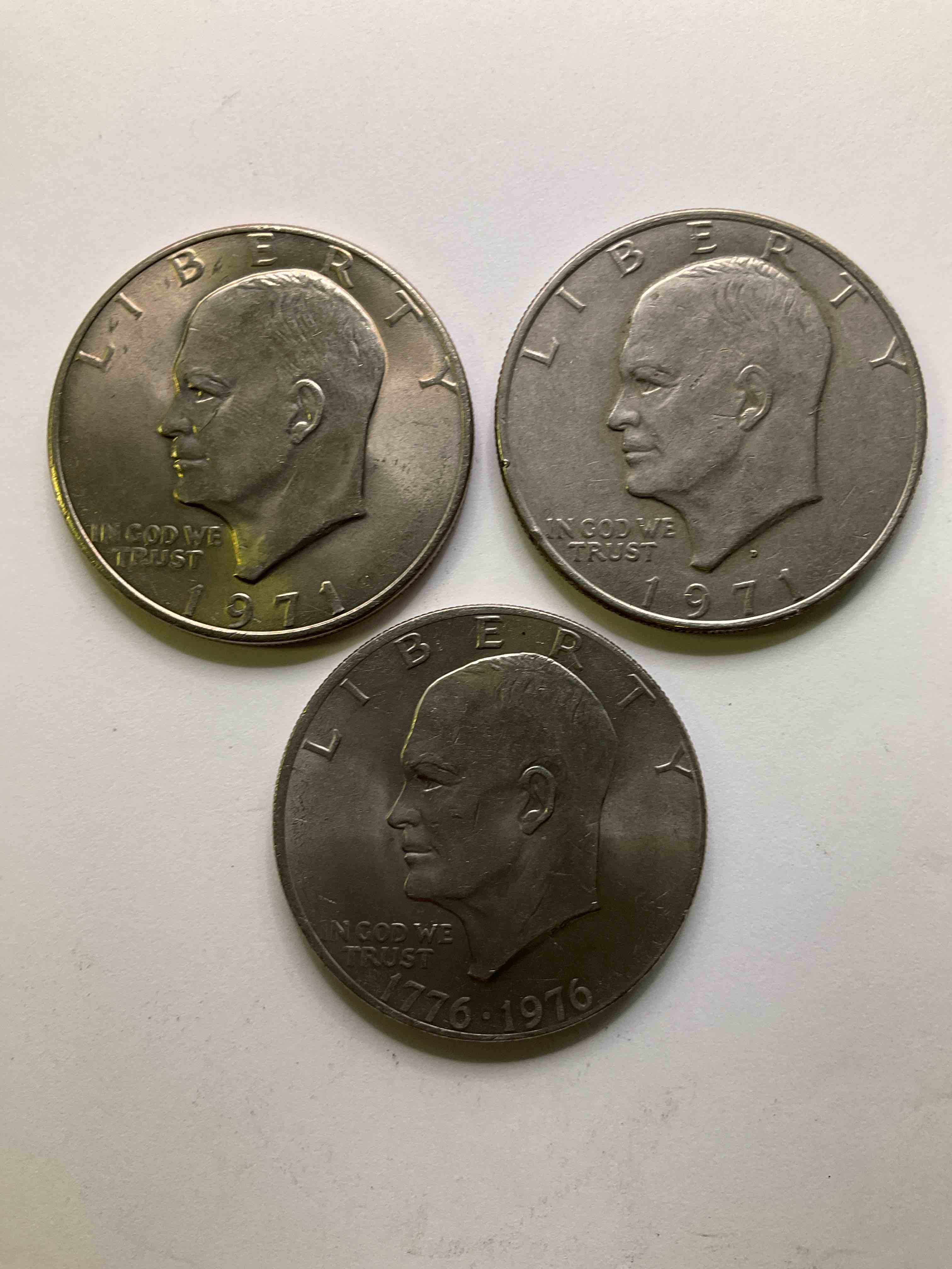 Eisenhower Dollar Coins! These Striking, Large U.S. Coins Were Minted From 1971-1978. Here Are Gorgeous Of Examples Of "Ike" Dollars In Varying Years. Includes The Highly Collectible 1976 Bicentennial Version. These Coins Have Become Immensely Popular With Collectors & Some Have Great Toning!