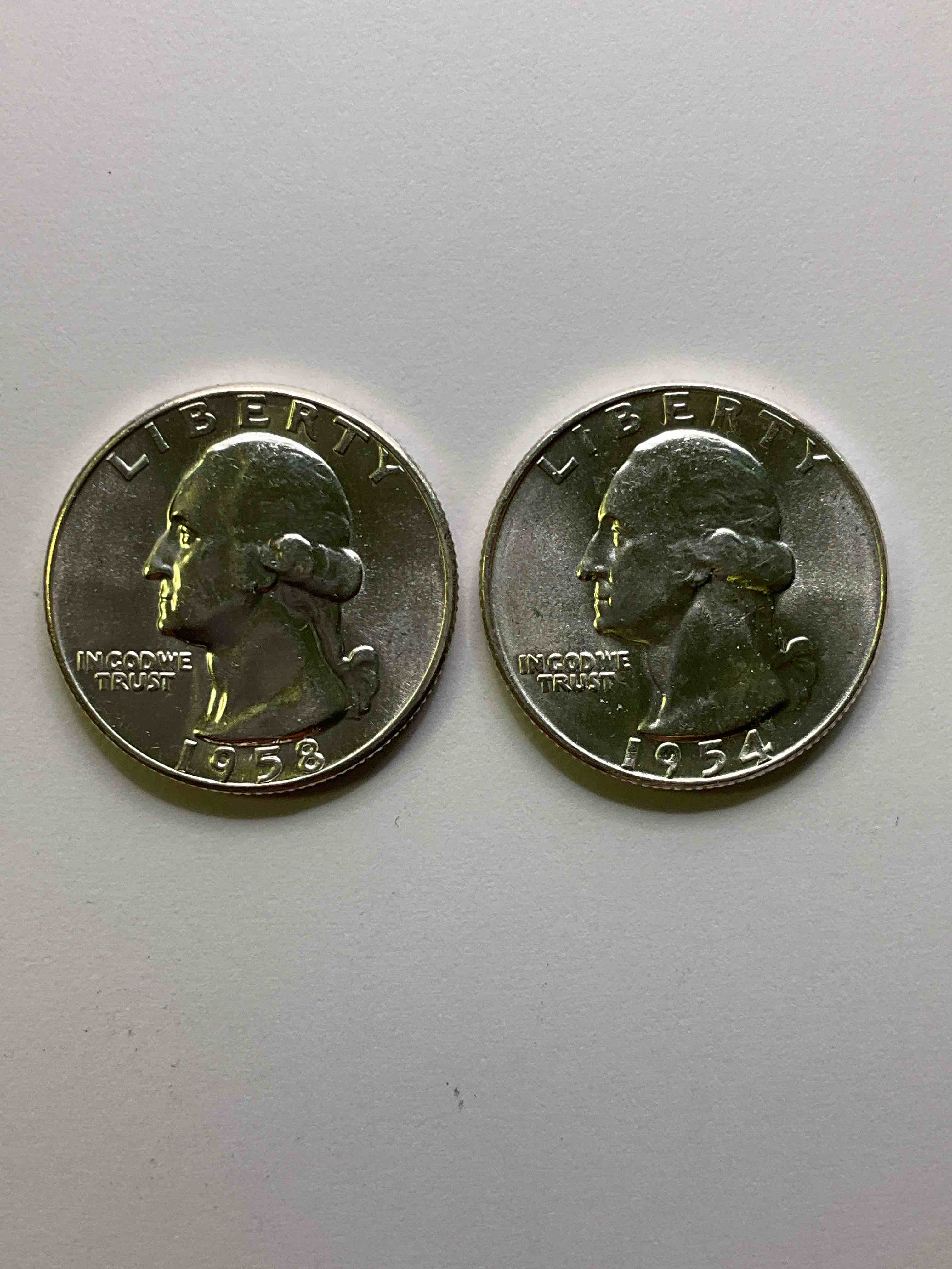 George Washington Uncirculated Silver! Pre 1965 U.S. Quarter Dollar Coins Were Actually Silver, Here Are two Great Examples Of Awesome, Pristine George Washington Silver Quarters, Stunning & Uncirculated! Rare 1954 Mint & 1958! Great For Investing In Precious Metals! These Coins Were Minted At 90% Silver and 10% Copper, Giving Them A Net Weight Of .18084 Ounces Of Pure Silver Per Coin! Very Hard To Find Uncirculated, Stunning! Invest In Fine U.S. Silver!