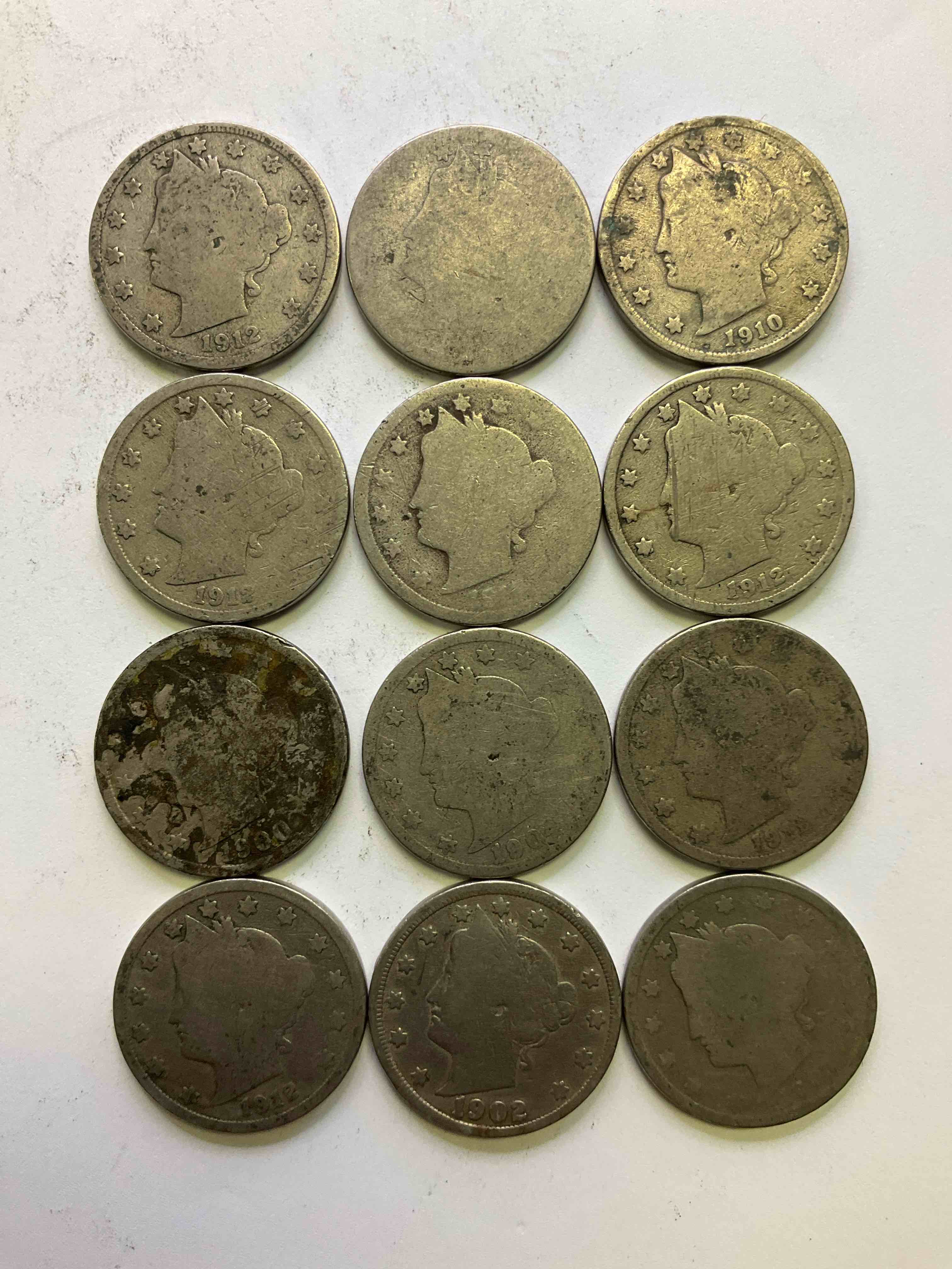 Antique U.S. "V" Nickels, 1912 Year Of The Titanic! Nearly Impossible To Collect! Antique V Nickels, Includes At Least One 1912, The Year Of The Sinking Of The Titanic! Own A Piece Of History Great For Coin Collectors, Think Of The History These Coins Have Seen! Liberty Head V Nickels Were Minted Up Until 1913 & Were The Style Of Nickels Before Buffalo Nickels. Own Some Cool Pieces Of History! Rare To See These Coins With The "Date On" In Circulated Condition!