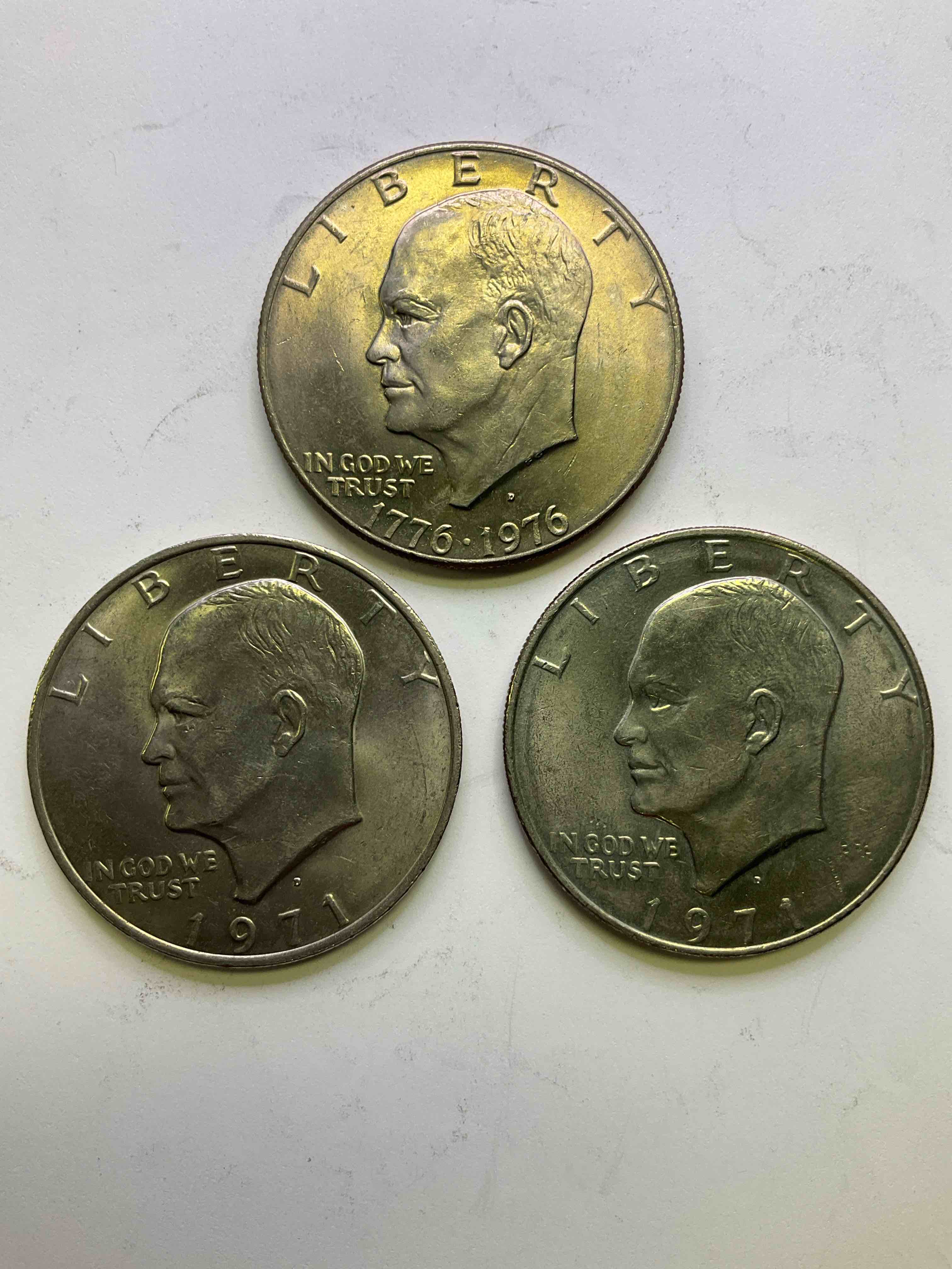 Eisenhower Dollar Coins! These Striking, Large U.S. Coins Were Minted From 1971-1978. Here Are Gorgeous Of Examples Of "Ike" Dollars In Varying Years. Includes The Highly Collectible 1976 Bicentennial Version. These Coins Have Become Immensely Popular With Collectors & Some Have Great Toning!