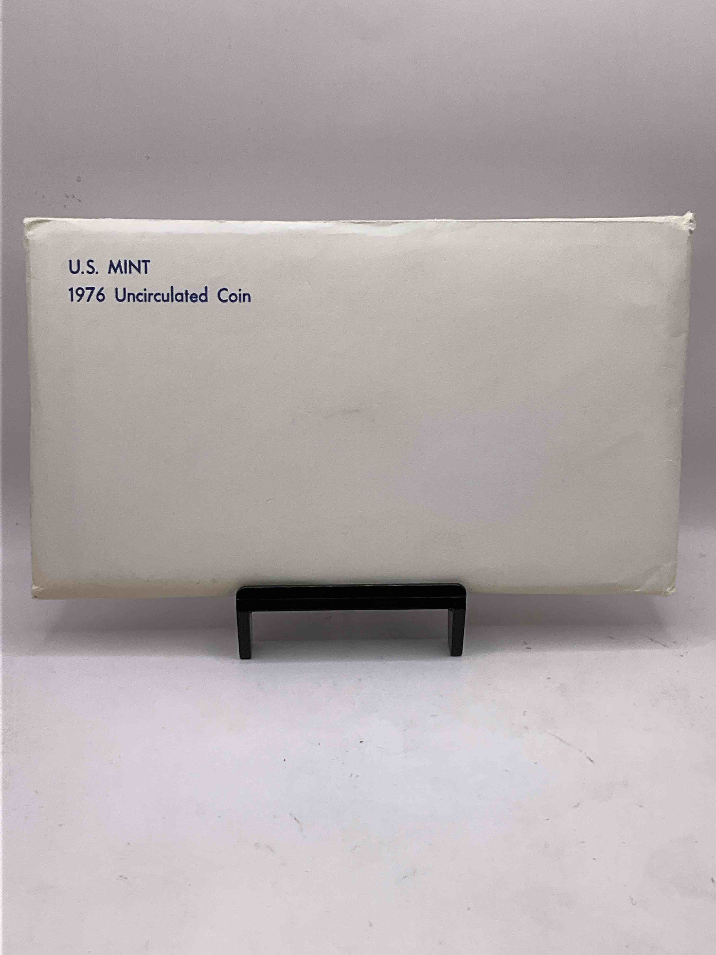 1976 Bicentennial Mint Set! This Highly Collectible Mint Set Includes 10 Coins, Five Minted From Each Mint Location (Philly & Denver) That Year. Coins Are 1976 Special Bicentennial Edition, To Include Rare Bicentennial "Ike" Dollar! Still In Its Original Envelope Direct From The U.S. Treasury in 1976!