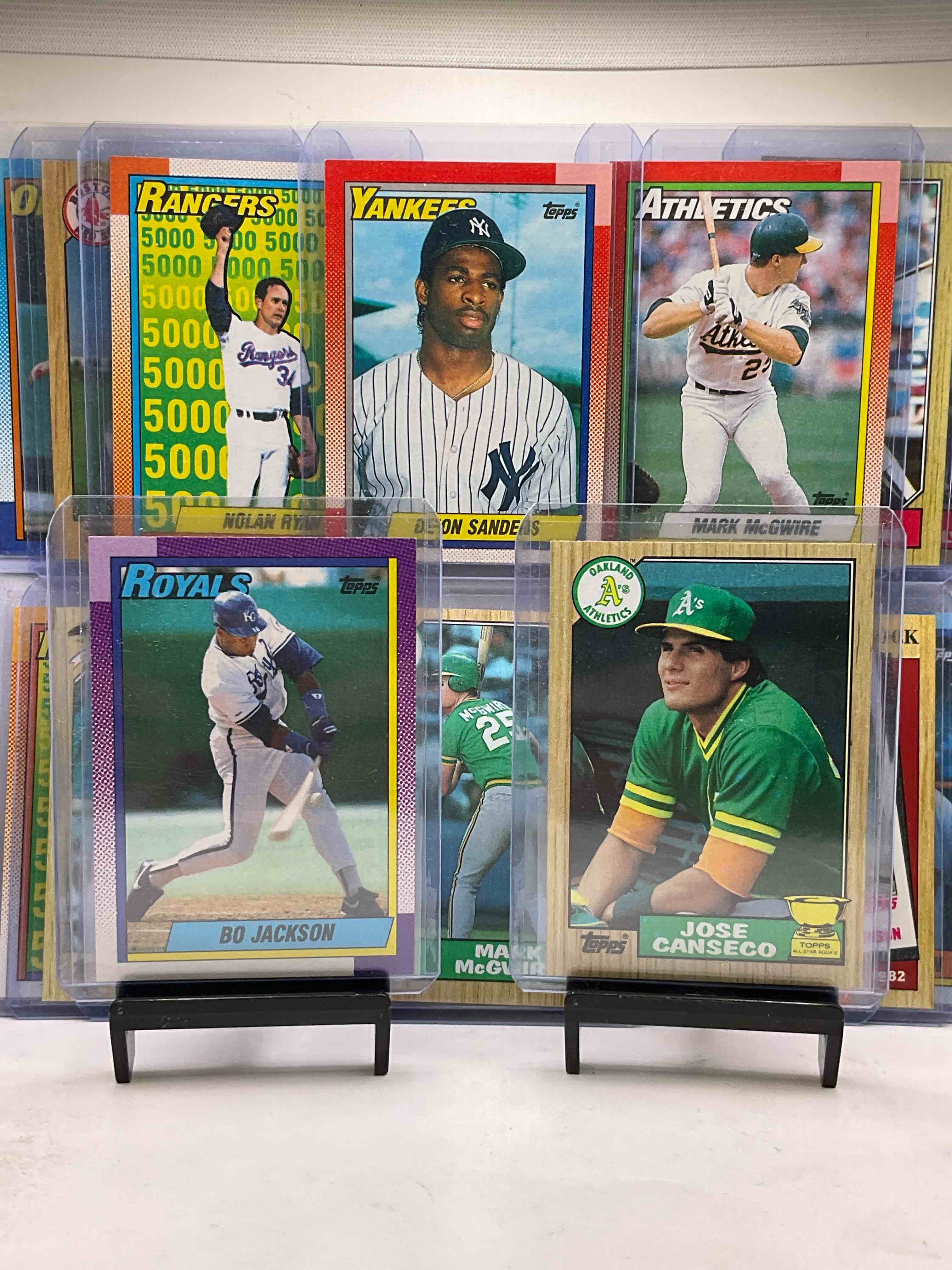 80’s & 90’s Baseball Fans Rejoice! The Best Players & Cards!Jose Canseco Rookie, Bo Jackson, Nolan Ryan, Deion Sanders, Mark McGwire, Pete Rose, Roger Clemens, Don Mattingly, Randy Johnson & Rickey Henderson! All In Hard Cases! Wow!