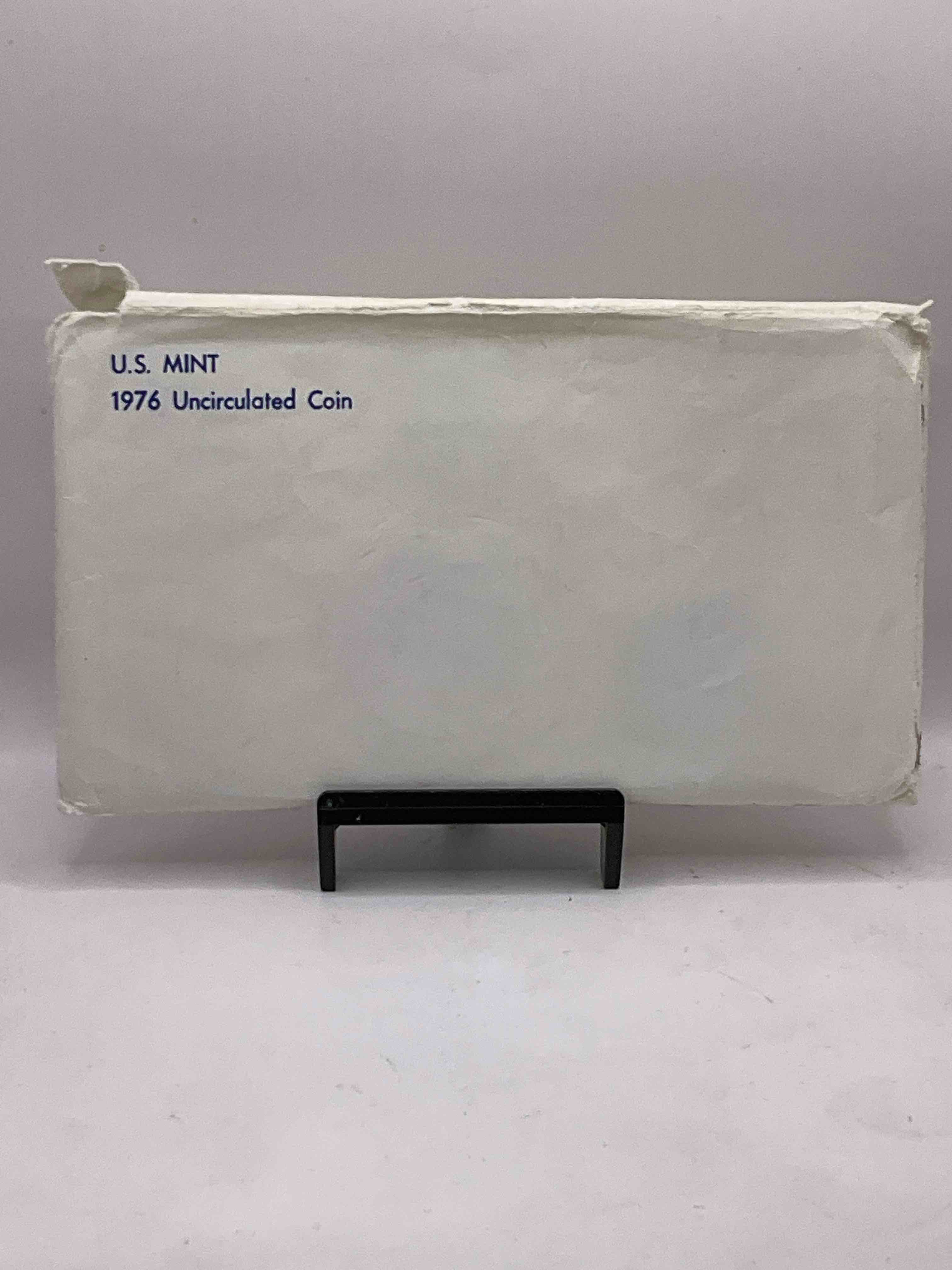 1976 Bicentennial Mint Set! This Highly Collectible Mint Set Includes 10 Coins, Five Minted From Each Mint Location (Philly & Denver) That Year. Coins Are 1976 Special Bicentennial Edition, To Include Rare Bicentennial "Ike" Dollar! Still In Its Original Envelope Direct From The U.S. Treasury in 1976!