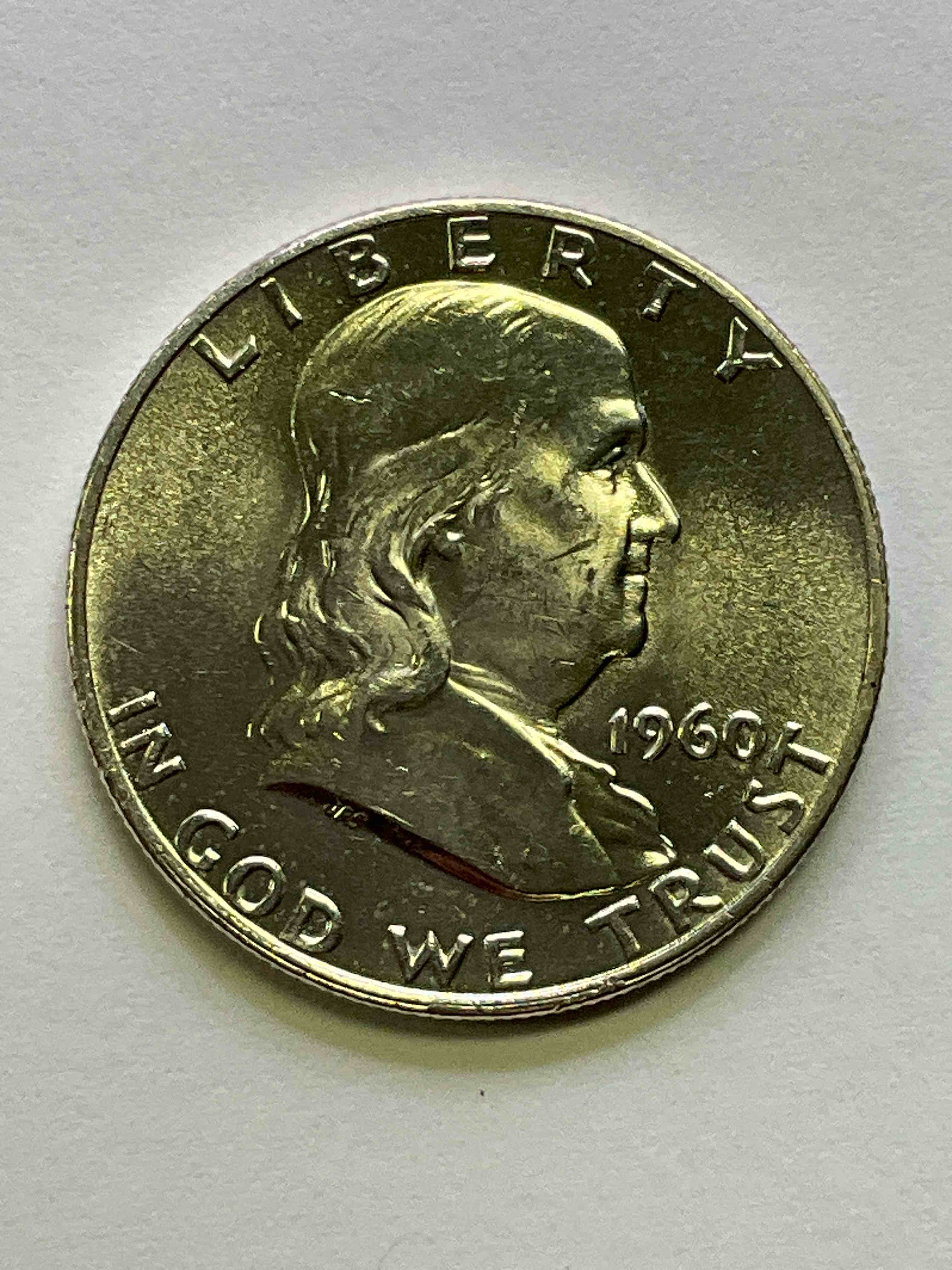 Uncirculated Ben Franklin Silver! Pre 1965 Silver U.S. Half Dollar Coin! Before 1965 American Half Dollars Were Actually Silver, Here Is A Rare 1960 Version In Excellent, Uncirculated Condition! Great For Investing In Precious Metals! This Heavy Half Dollar Was Minted At 90% Silver and 10% Copper, Giving It A Net Weight Of .36169 Ounces Of Pure Silver! Very Rare In This Great Condition!