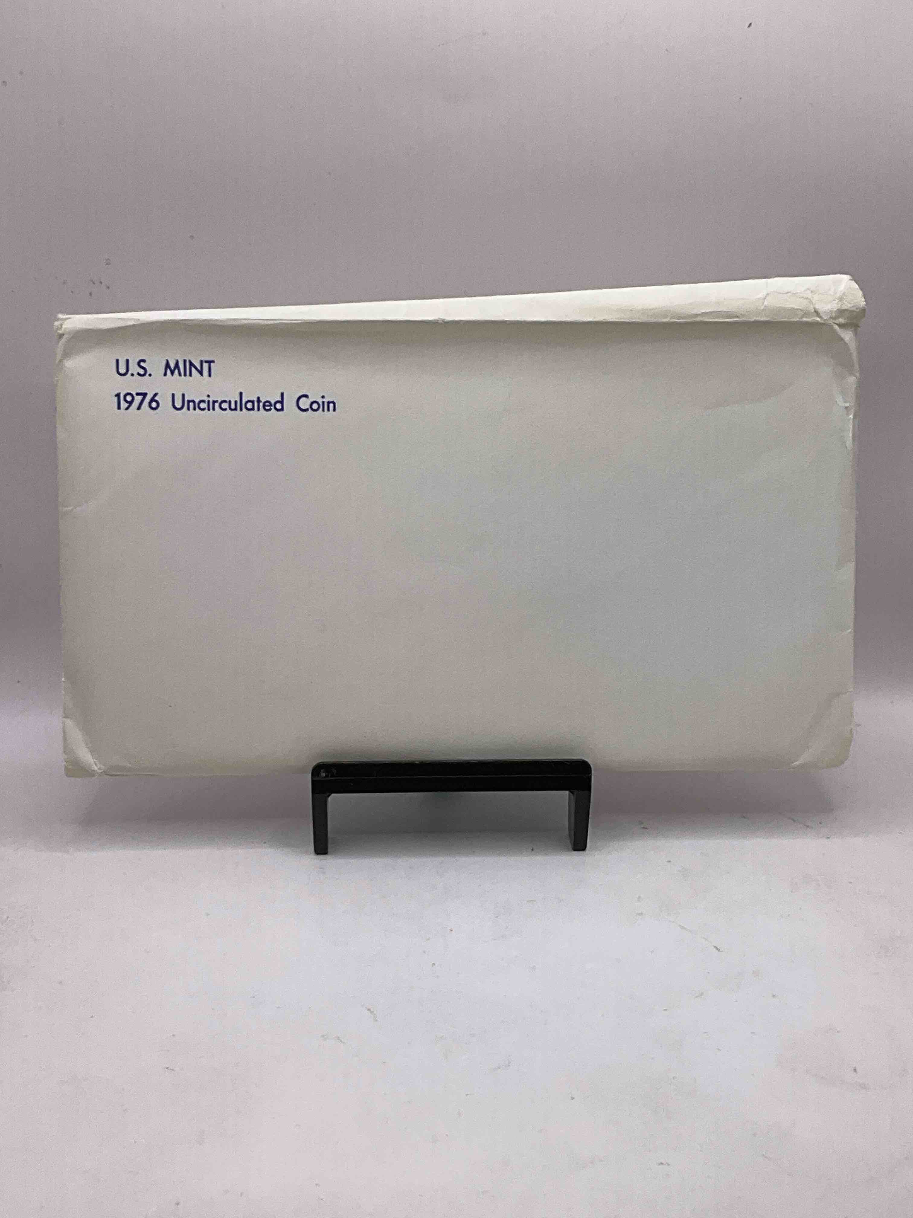 1976 Bicentennial Mint Set! This Highly Collectible Mint Set Includes 10 Coins, Five Minted From Each Mint Location (Philly & Denver) That Year. Coins Are 1976 Special Bicentennial Edition, To Include Rare Bicentennial "Ike" Dollar! Still In Its Original Envelope Direct From The U.S. Treasury in 1976!