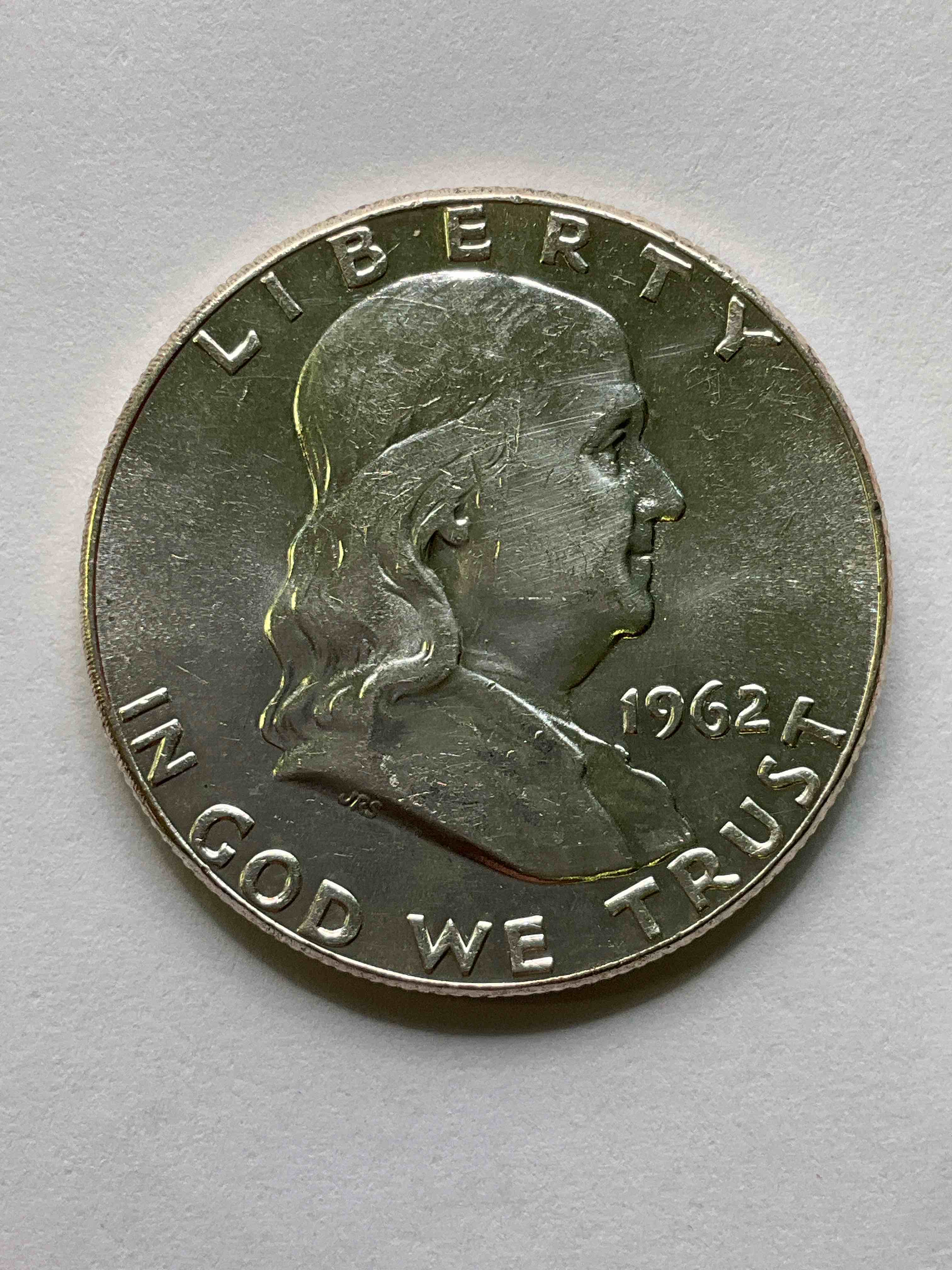 Uncirculated Ben Franklin Silver! Pre 1965 Silver U.S. Half Dollar Coins! Before 1965 American Half Dollars Were Actually Silver, Here Is A Rare 1962 Version In Excellent, Uncirculated Condition! Great For Investing In Precious Metals! This Heavy Half Dollar Was Minted At 90% Silver and 10% Copper, Giving It A Net Weight Of .36169 Ounces Of Pure Silver! Very Rare In This Great Condition!