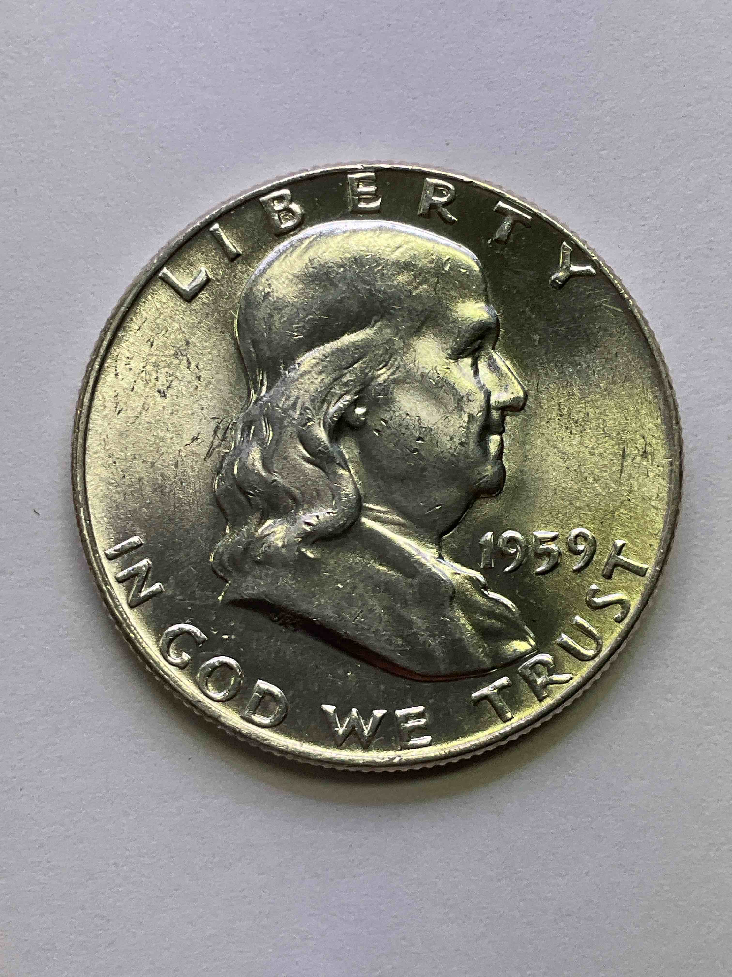 Uncirculated Ben Franklin Silver! Pre 1965 Silver U.S. Half Dollar Coins! Before 1965 American Half Dollars Were Actually Silver, Here Is A Rare 1959 Version In Excellent, Uncirculated Condition! Great For Investing In Precious Metals! This Heavy Half Dollar Was Minted At 90% Silver and 10% Copper, Giving It A Net Weight Of .36169 Ounces Of Pure Silver! Very Rare In This Great Condition!