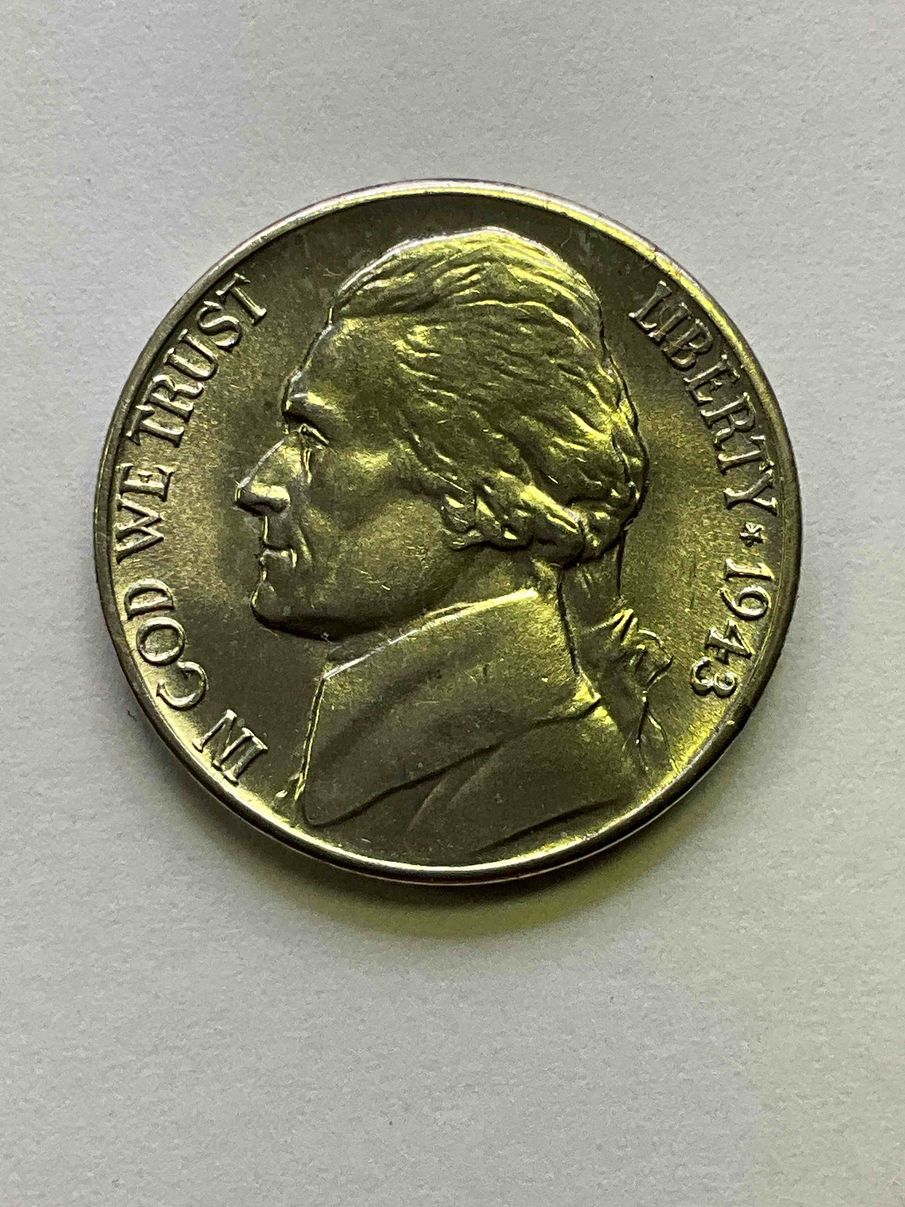 1943 World War II Uncirculated U.S. Silver! Did You Know That Nickels Were Actually Made Of Silver During World War II From 1942-45? This Is Because America Needed Nickel To Make Ammunition, So The U.S. Treasury Made Nickels Out Of Partial Silver Instead Of Nickel For These Three Years Only! Here Is An Awesome Example Of An Uncirculated, Pristine 1945 Silver Nickel! Own A Rare Piece Of Valuable World War II Precious Metal History! VERY Hard To Find!