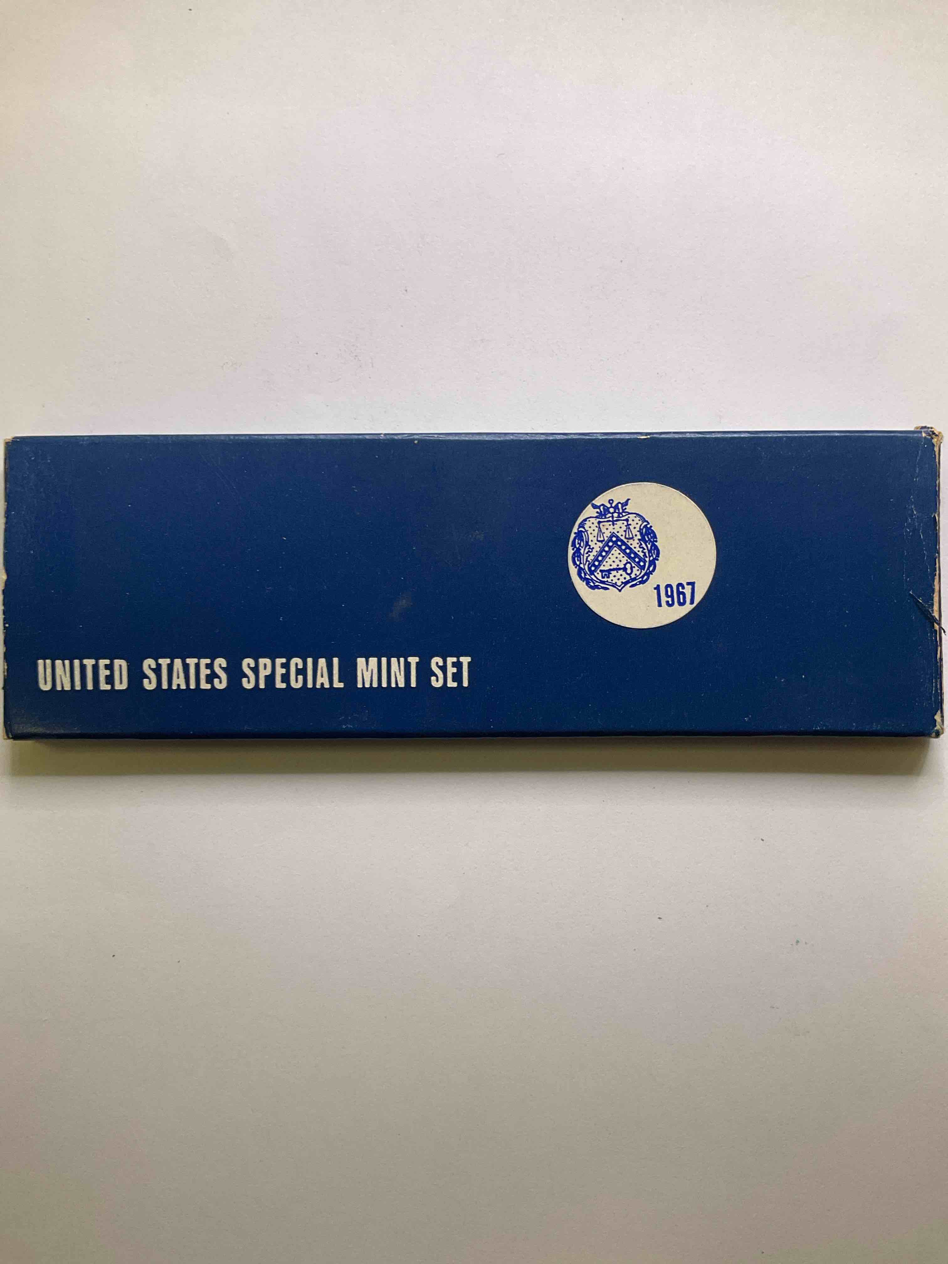 1967 Summer Of Love Mint Set With Silver! Own An Awesome Piece Of History In This 1967 "Summer Of Love" U.S. Coin Mint Set Originally Direct From The U.S. Treasury & Still In Protective Sleeve. Encased Coins Feature Each Coin Minted In 1967, To Include A 40% Silver Kennedy Half Dollar! Own A Cool Piece Of History!