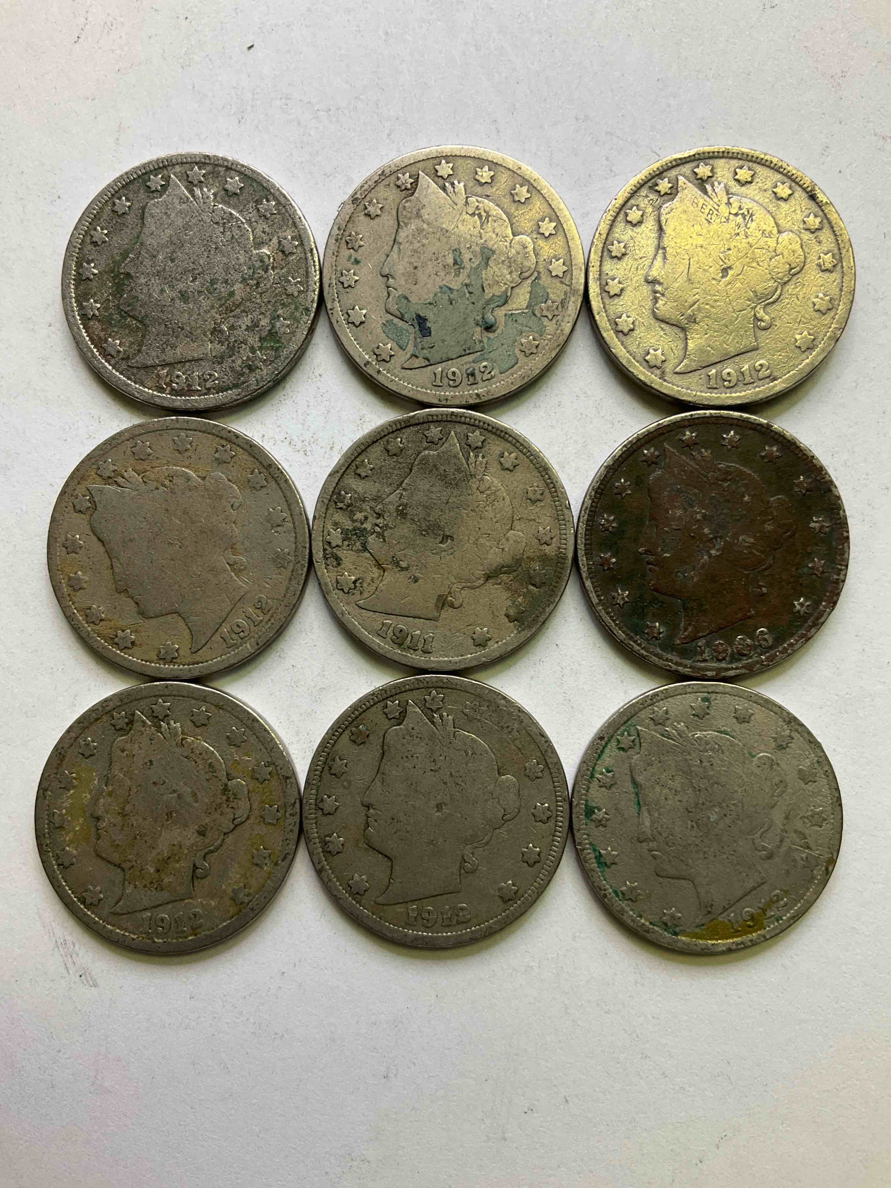 Antique U.S. "V" Nickels, 1912 Year Of The Titanic! Nearly Impossible To Collect! Antique V Nickels, Includes At Least One 1912, The Year Of The Sinking Of The Titanic! Own A Piece Of History Great For Coin Collectors, Think Of The History These Coins Have Seen! Liberty Head V Nickels Were Minted Up Until 1913 & Were The Style Of Nickels Before Buffalo Nickels. Own Some Cool Pieces Of History! Rare To See These Coins With The "Date On" In Circulated Condition!