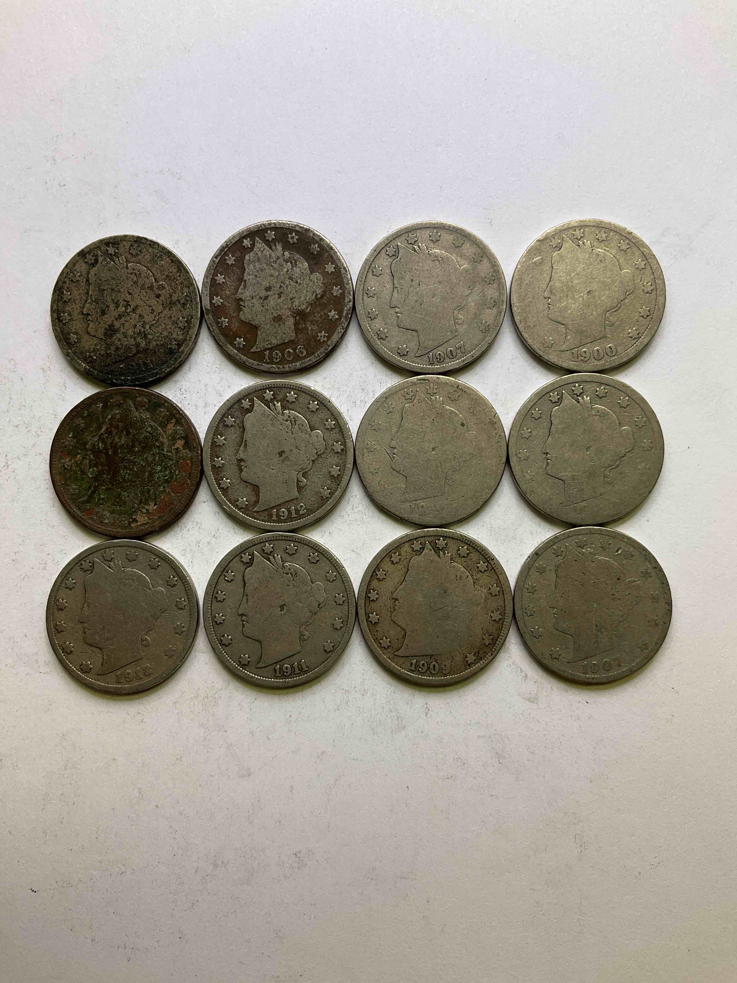 Antique U.S. "V" Nickels, 1912 Year Of The Titanic! Nearly Impossible To Collect! Antique V Nickels, Includes At Least One 1912, The Year Of The Sinking Of The Titanic! Own A Piece Of History Great For Coin Collectors, Think Of The History These Coins Have Seen! Liberty Head V Nickels Were Minted Up Until 1913 & Were The Style Of Nickels Before Buffalo Nickels. Own Some Cool Pieces Of History! Rare To See These Coins With Date On!